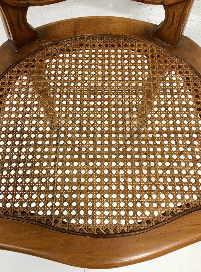 MidCentury Pair Of French Style Carved Wood and Cane Chairs For Sale