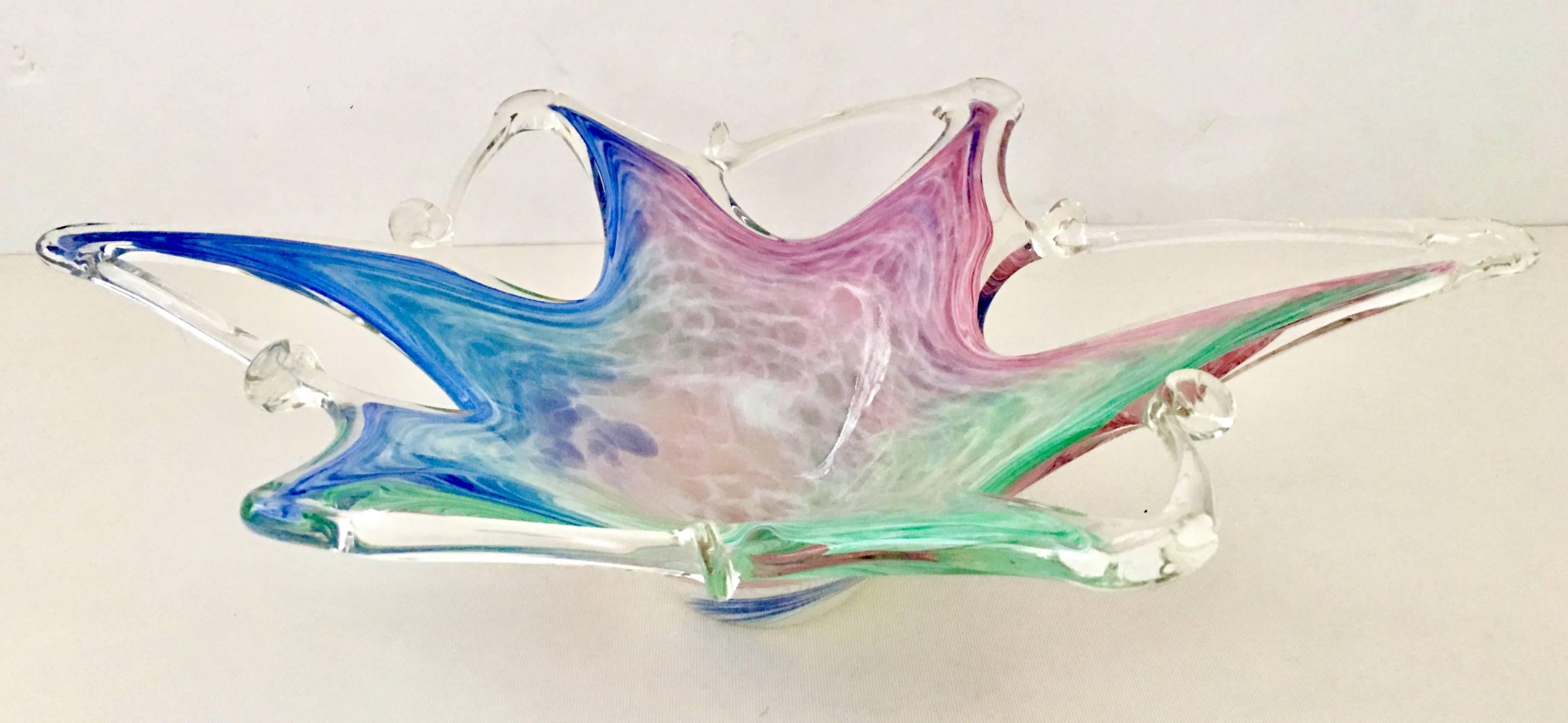 Vintage rare and stunning Italian Murano cased glass abstract star fish centre bowl. Features a rainbow swirl of colors in white, pink, blue and green.