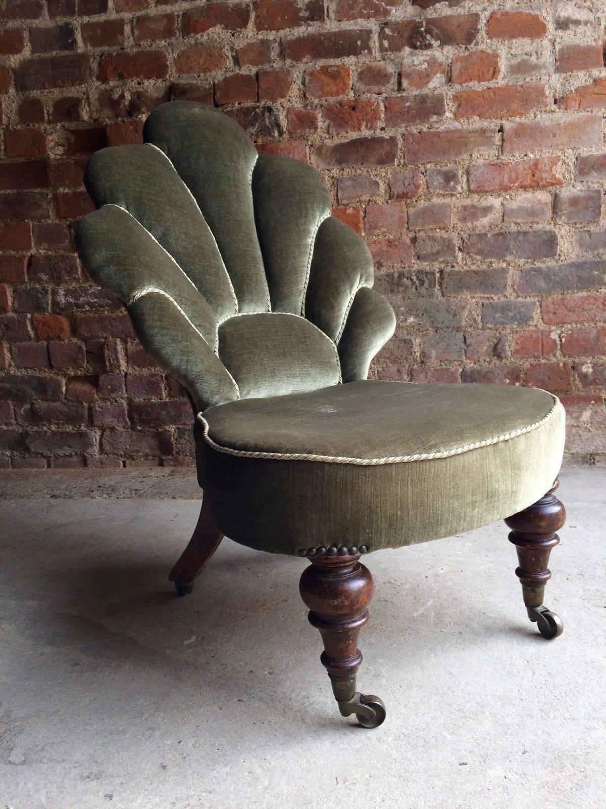 Fabulous small Victorian fan back nursing chair in olive green velvet

Description:

A beautiful small and petit 19th century Victorian fan back nursing chair upholstered in Olive green velvet, raised on turned front legs and raised on brass