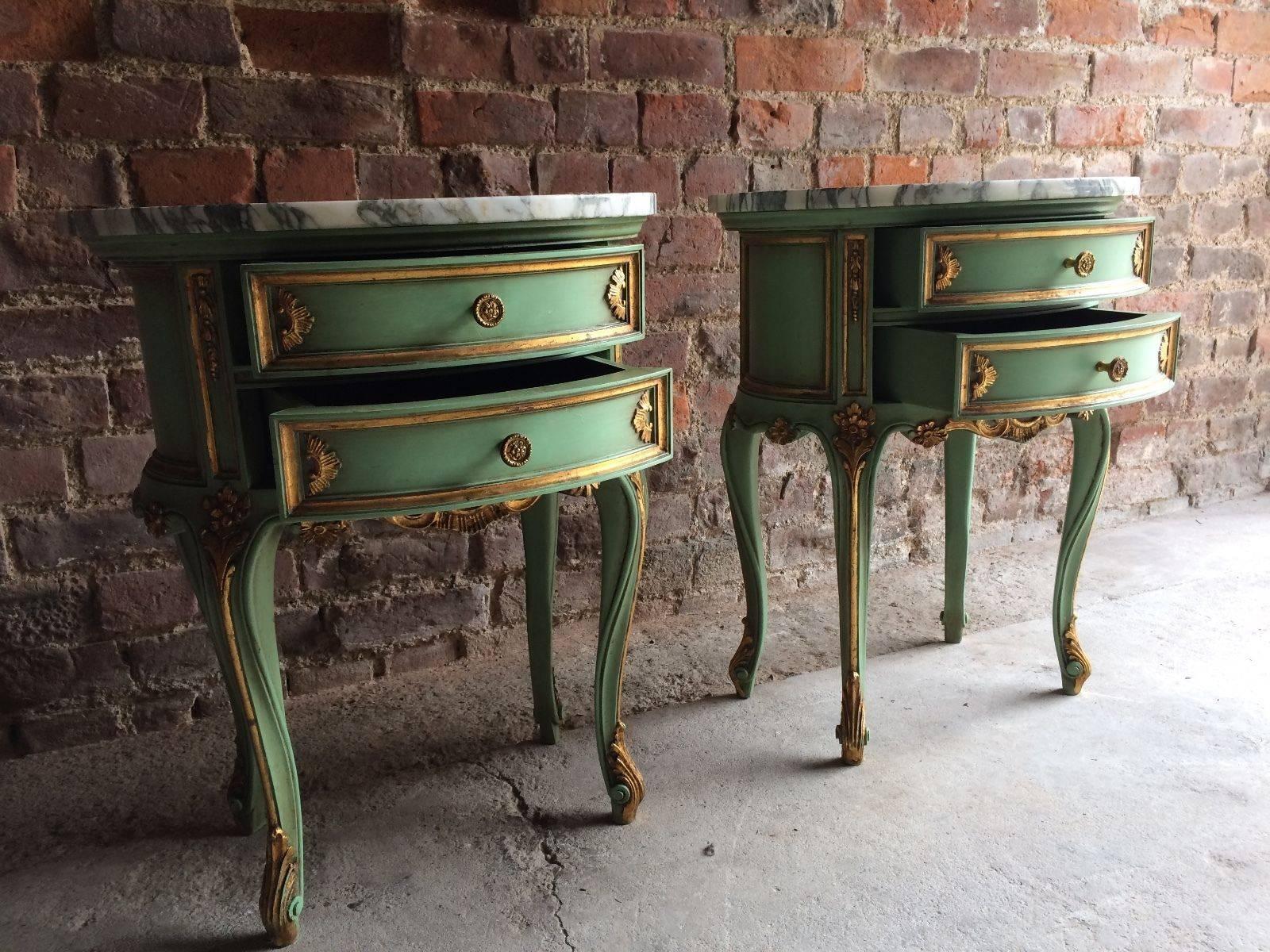 Stunning pair of French Rococo style marble topped bedside tables 

Description:

A fabulous pair of French Rococo style marble topped green painted beside tables, having a wonderful green veined marble top fitted with two small drawers and
