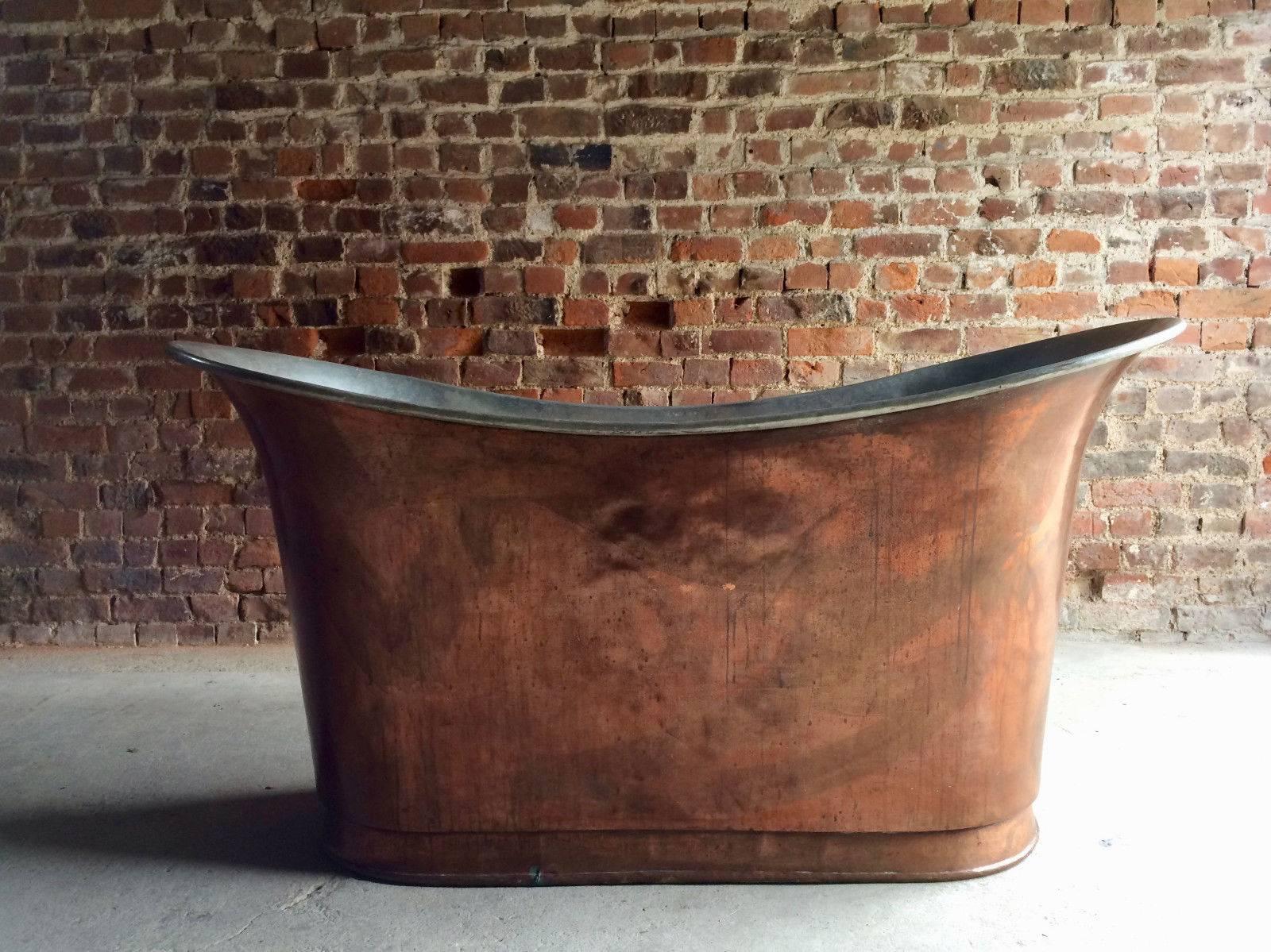 A stunningly beautiful antique French freestanding copper bath with tin lined interior, dating from early 20th century, wonderful aged patination to the copper giving lots of character, looks truly amazing!