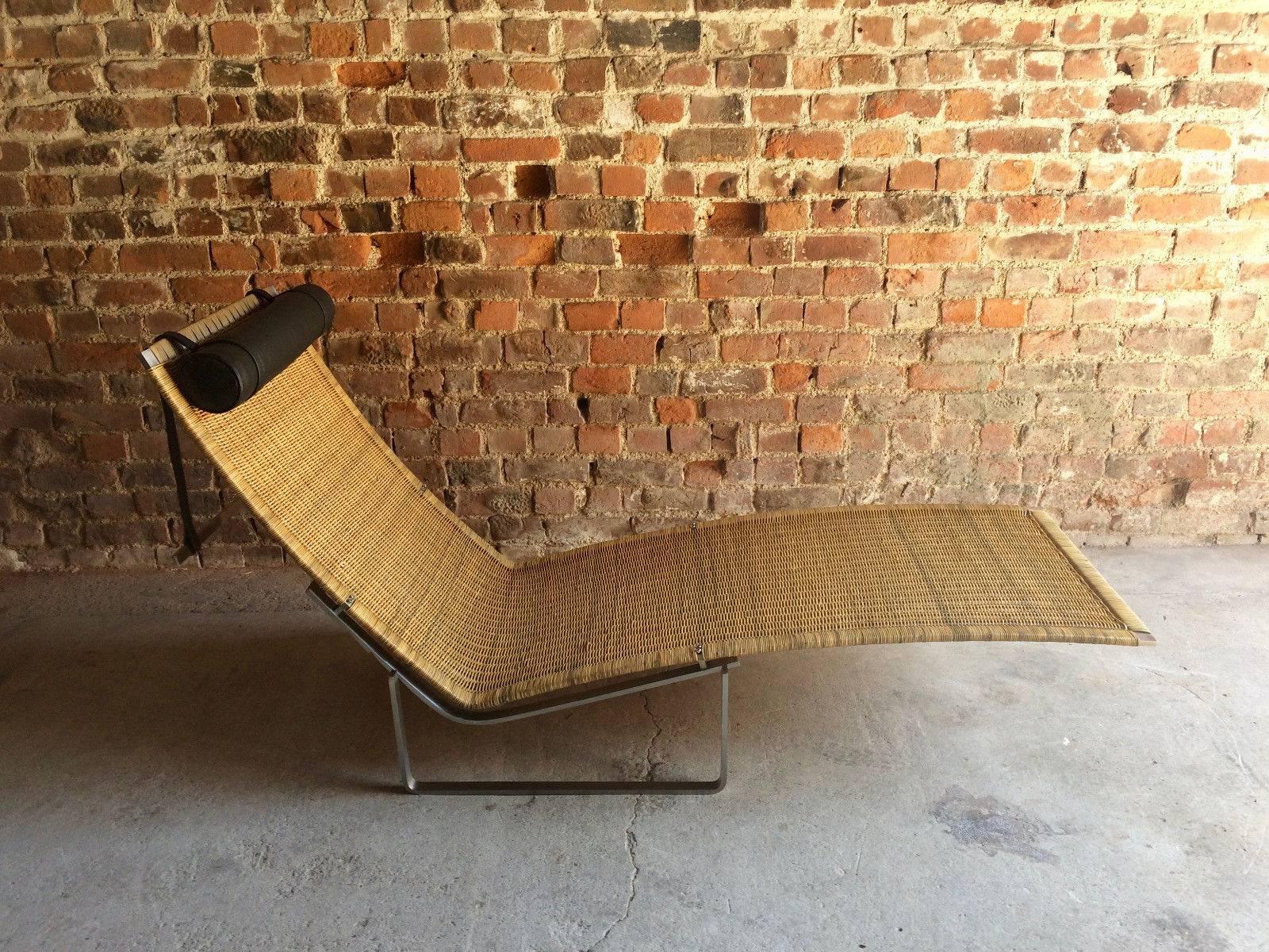 A magnificent 'right on trend' iconic designer lounger after Poul Kjærholm, a chaise longue lounger model no. PK24 designed by Poul Kjaerholm originally produced for the first time in 1965, this chair is composed of three elements, the brushed steel