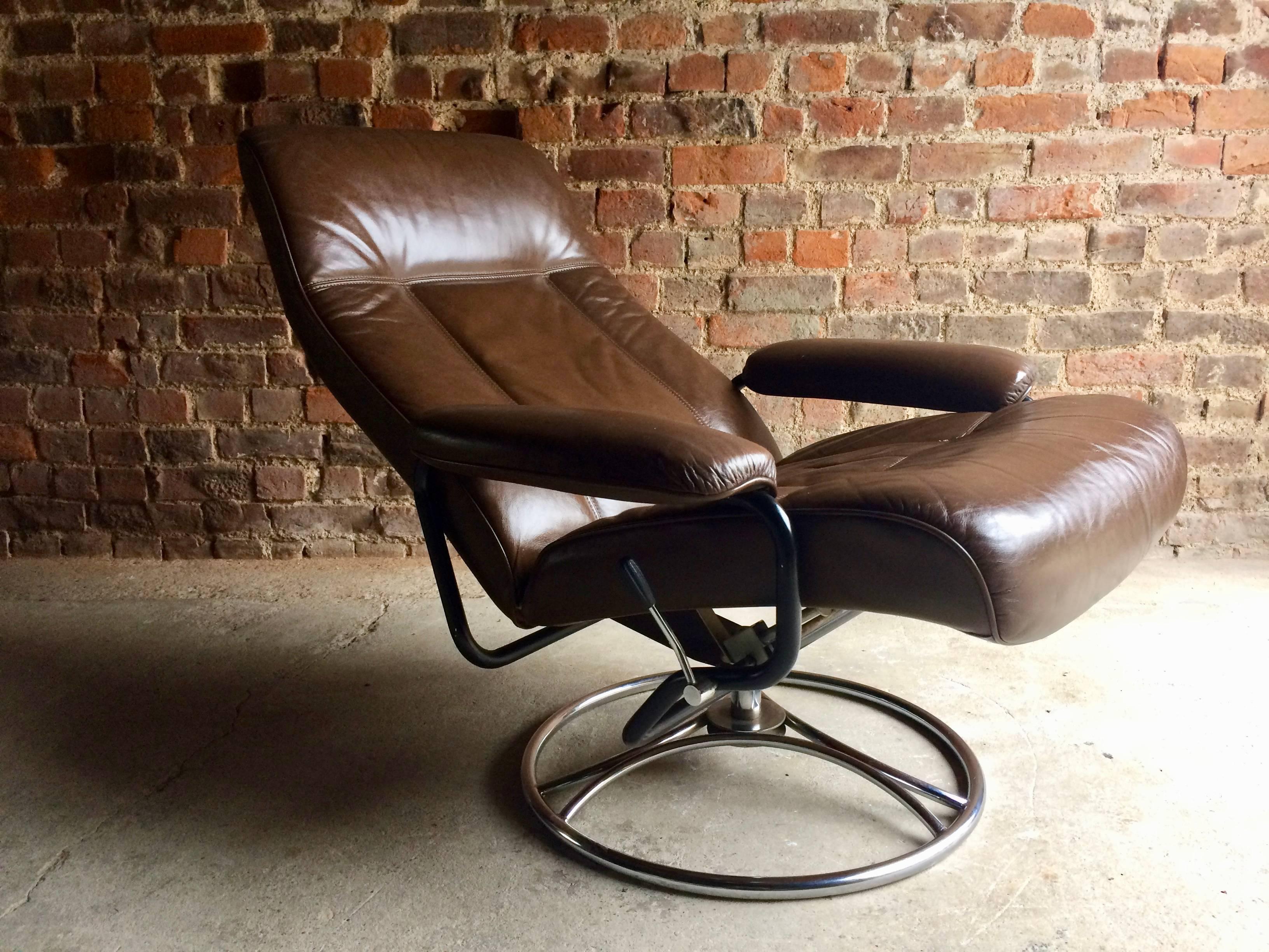 A magnificent Mid-Century, 1970s, Swedish leather reclining swivel armchair with chromed metal base by Söderbergs of Sweden (label to base) the chair upholstered in soft chocolate brown leather is offered in superb condition with the softest leather