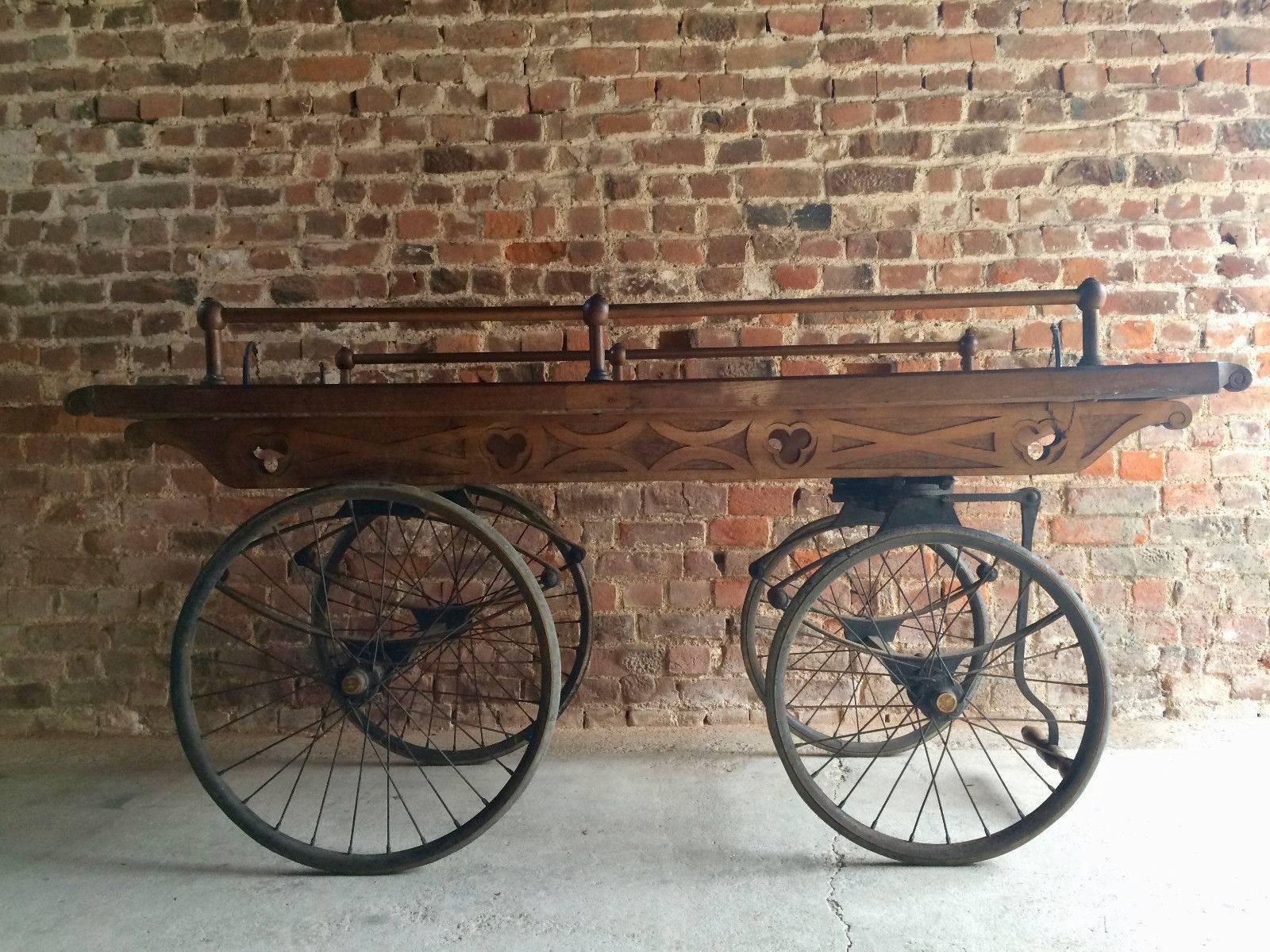 A magnificent Victorian 19th century coach built oak funeral Bier carriage, circa 1870, this casket carriage would have been used to carry the coffins of those that could not afford a luxurious horse drawn carriage for their loved ones, complete in