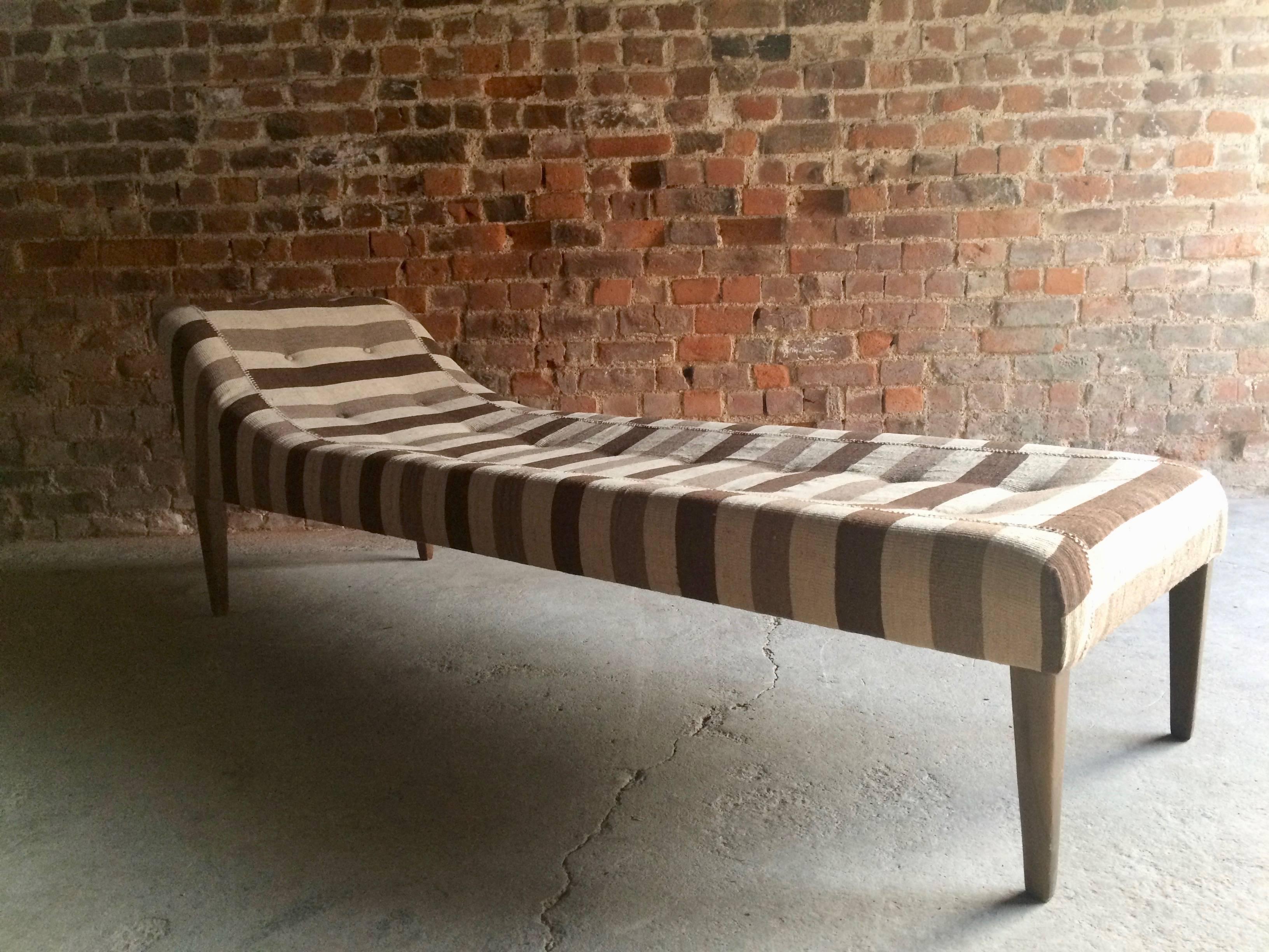 A stunning Fendi Casa chaise longue or daybed, upholstered in Persian natural dyed Jijin hand woven fabric, on oak legs, offered in excellent condition.