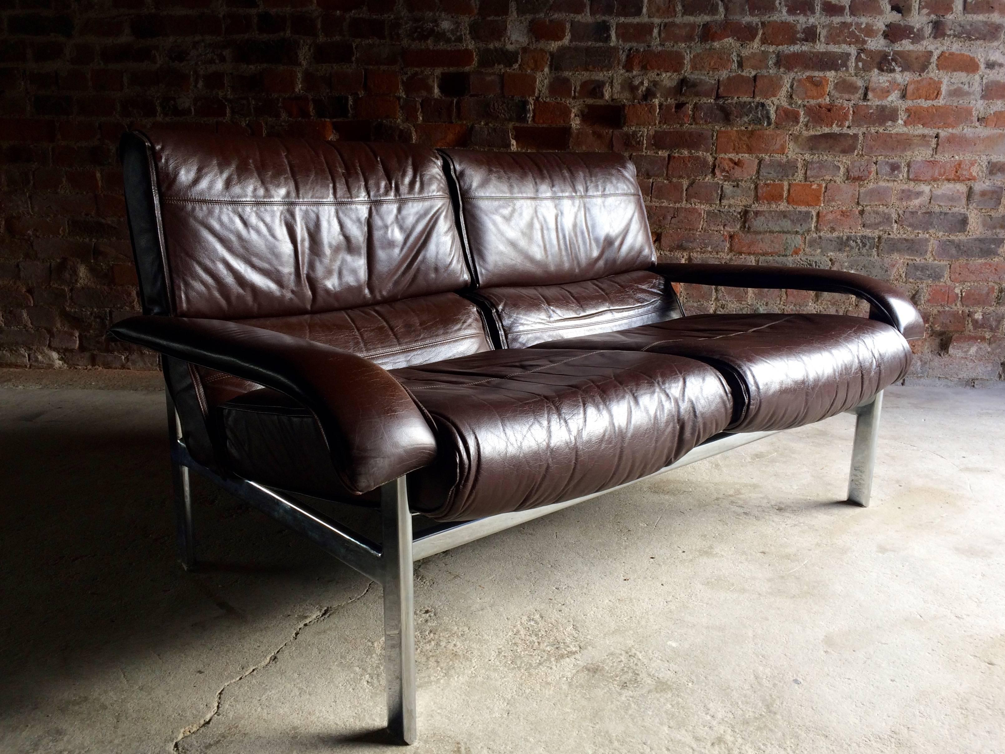 A stunningly beautiful vintage midcentury leather Pieff two-seat, designed in 1970s. The sofa having 
multiple detachable cushions in brown leather having the Pieff logo to underside, the settee itself being 
made up of flat tubular chrome