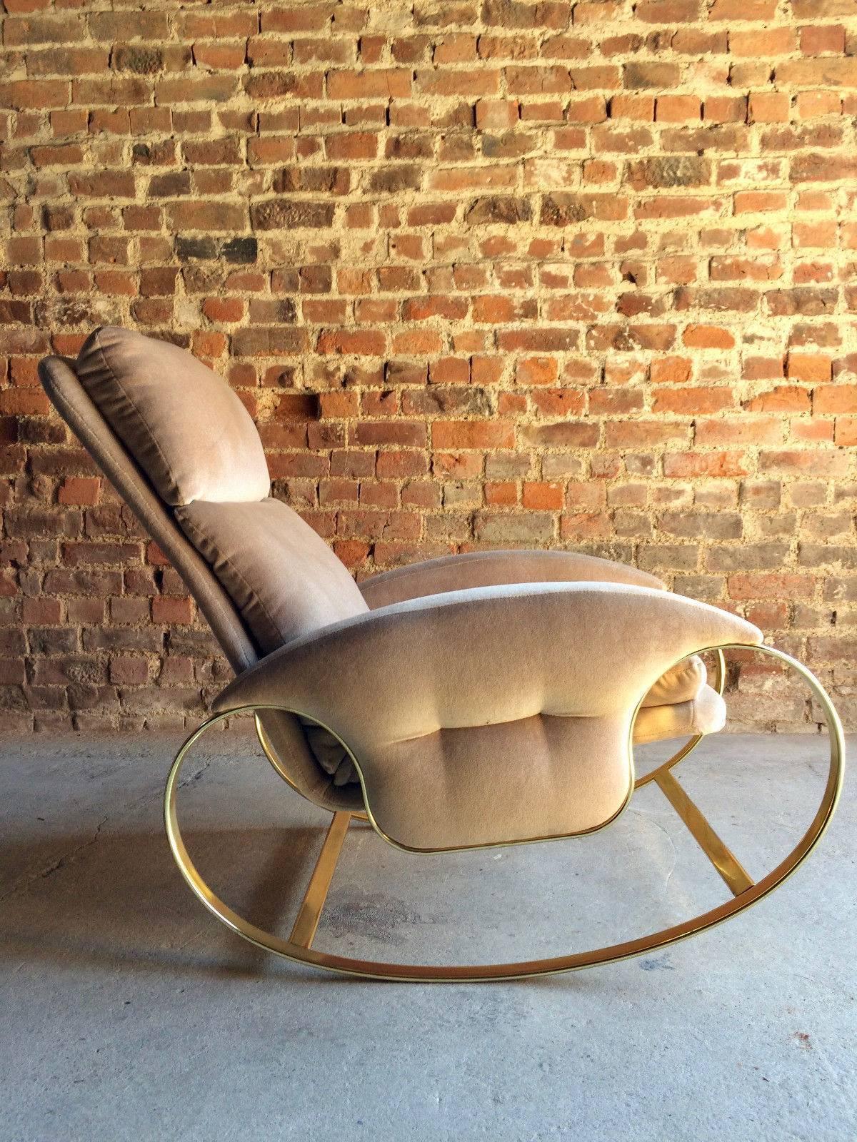 A stunning iconic 1970s Italian design Guido Faleschini gilded rocking chair, armchair, raised on stunning scroll worked frame with beige velour upholstered seat and backrest, the chair is offered in superb condition.