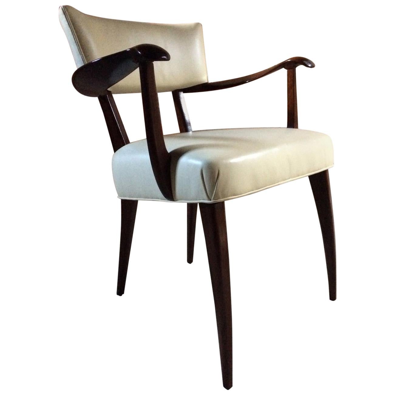 Paolo Buffa attributed cream leather upholstered and stained mahogany dining chairs with sabre legs, 20th century Italian design at its very best, recently restored and renovated including two carvers, this set dating to 1940s and offered in