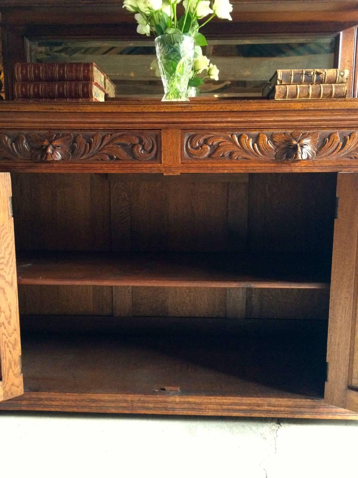 A beautiful antique Victorian Gothic Revival carved solid oak sideboard dresser with “Green Man