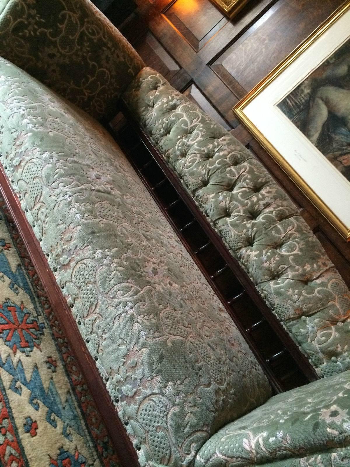 A beautiful large quality antique Victorian oak framed three-seat sofa, having a spindle back, scrolling shaped arms and turned legs, upholstered in a lush ’Green & Grey’ floral velvet material, the sofa is offered in great antique condition with