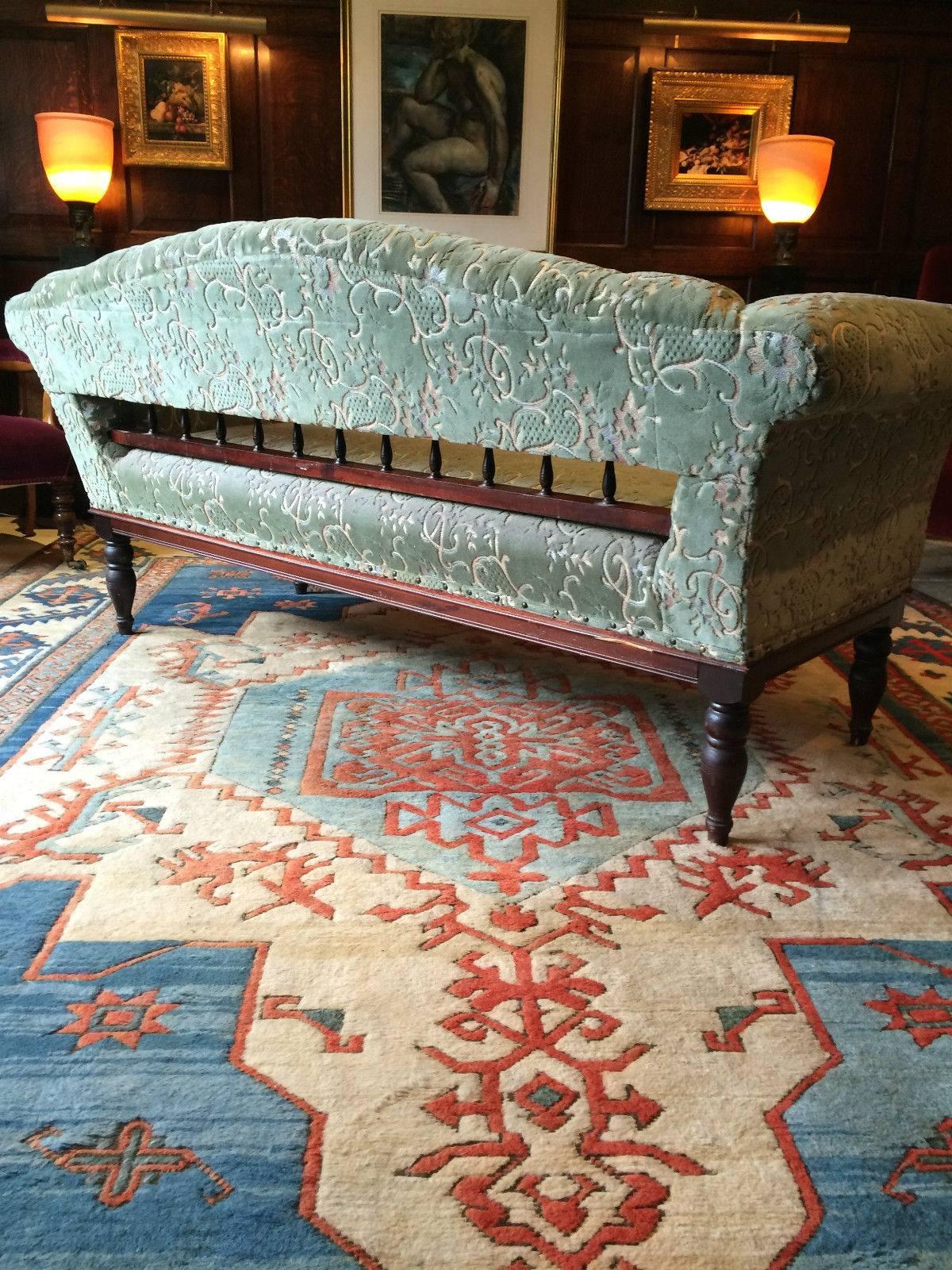 green velvet victorian sofa