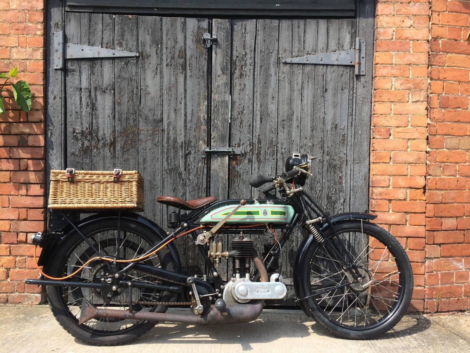 Triumph model P.

The model ‘P’ was Britain’s first mass-produced motorcycle:

They were built in Coventry from 1925-1927 at the rate of 1000 per week, and cost a mere 42 pounds, 17 shillings and sixpence.

 This 1927 model has a 5 horsepower,