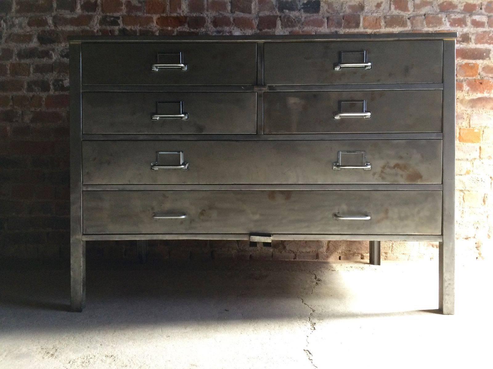 A beautiful vintage Industrial steel planters chest of drawers dresser with polished steel finish, rectangular top over four short and two long drawers, please note this is an extremely heavy piece of furniture that will require at least three to