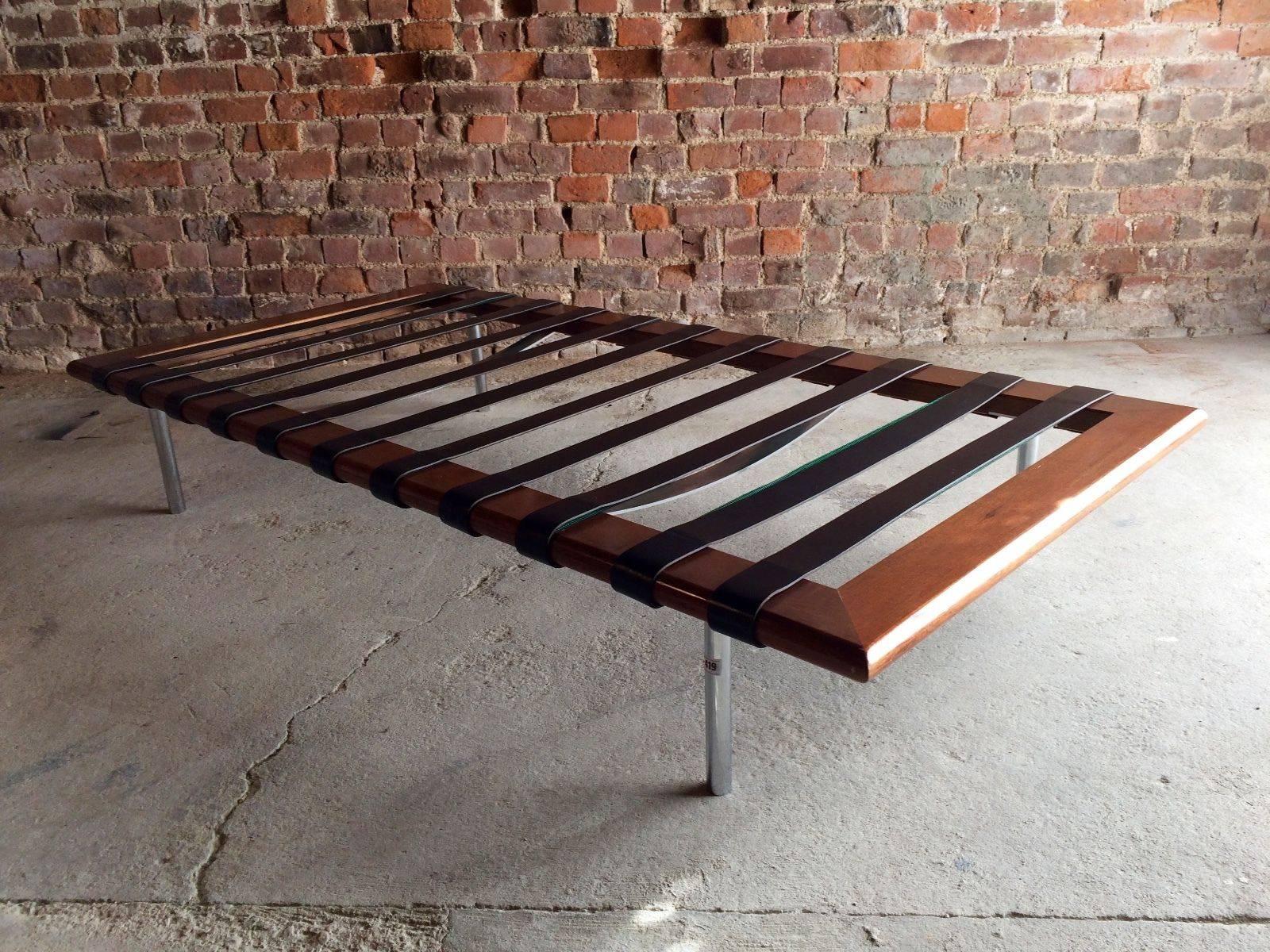 A stunning and iconic Barcelona daybed recreation from Bauhaus director Mies Van Rowe originally designed in 1929, beautifully proportioned with finely balanced detail, luxurious soft quilted black leather mattress and head roll resting on a clean