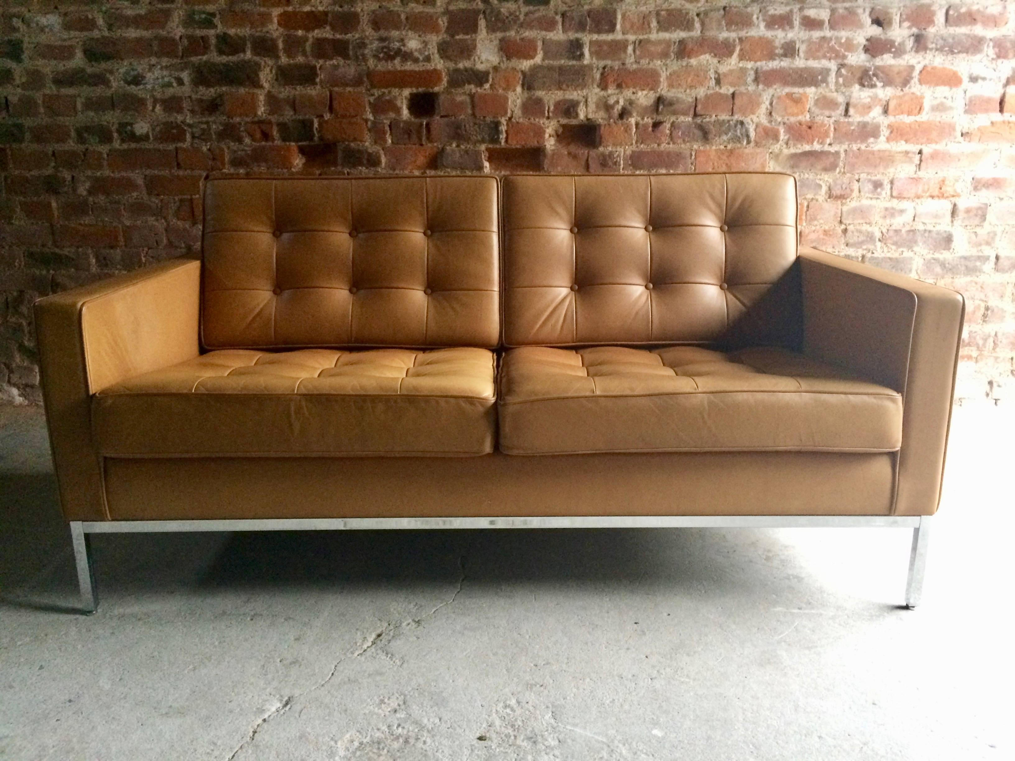 Original Florence Knoll by Knoll Studio two-seat tan leather sofa (one of a pair we have for sale), like so many of her groundbreaking designs that became the gold standard for the industry, Florence Knoll's 1954 lounge collection has made its way