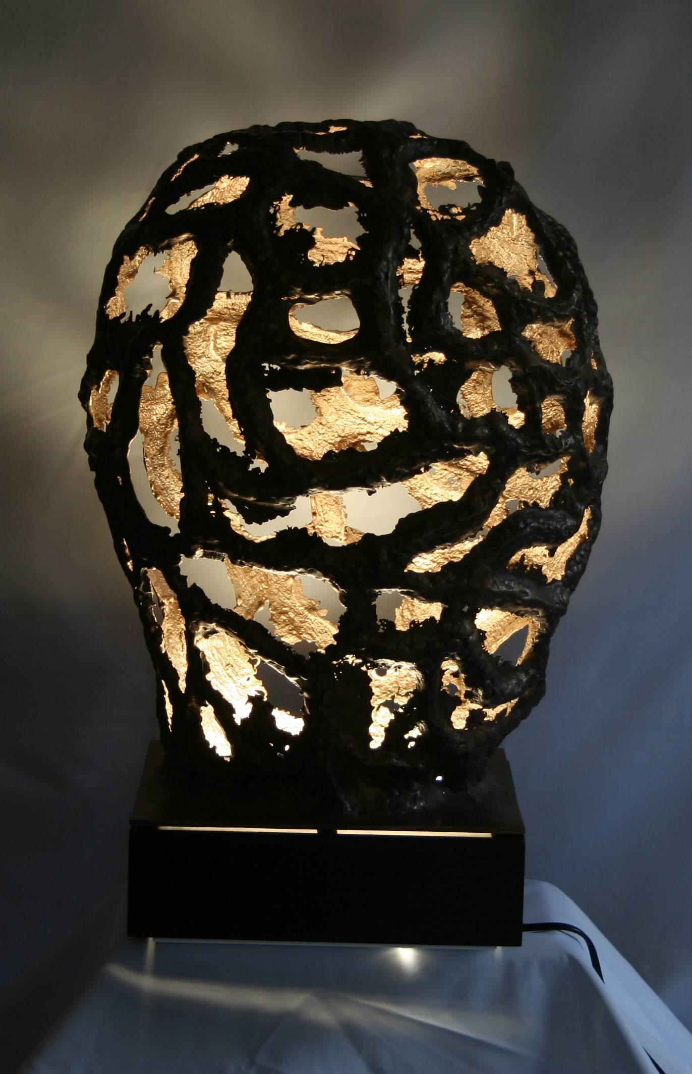 Table lamp in bronze named Synapse, base in wood, cast in sand - unique model designed directly in sand. Signed by sculptor and artist Robert Sobocinski for Arriau.