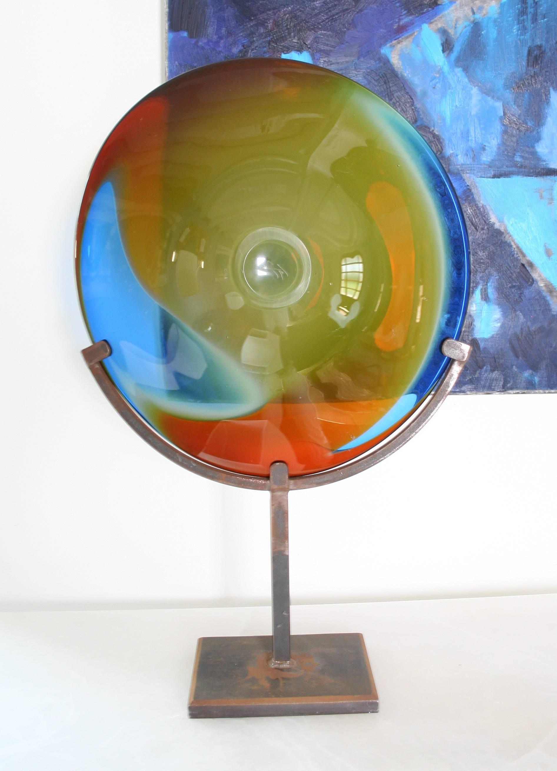 Unique great sculpture Solem in handcrafted glass.
Size: 42 cm width x 67 cm high. (diameter 42 cm)
Realized in France - signed by Jahn Noeil - Glassmaker artist
leg in steel.
 