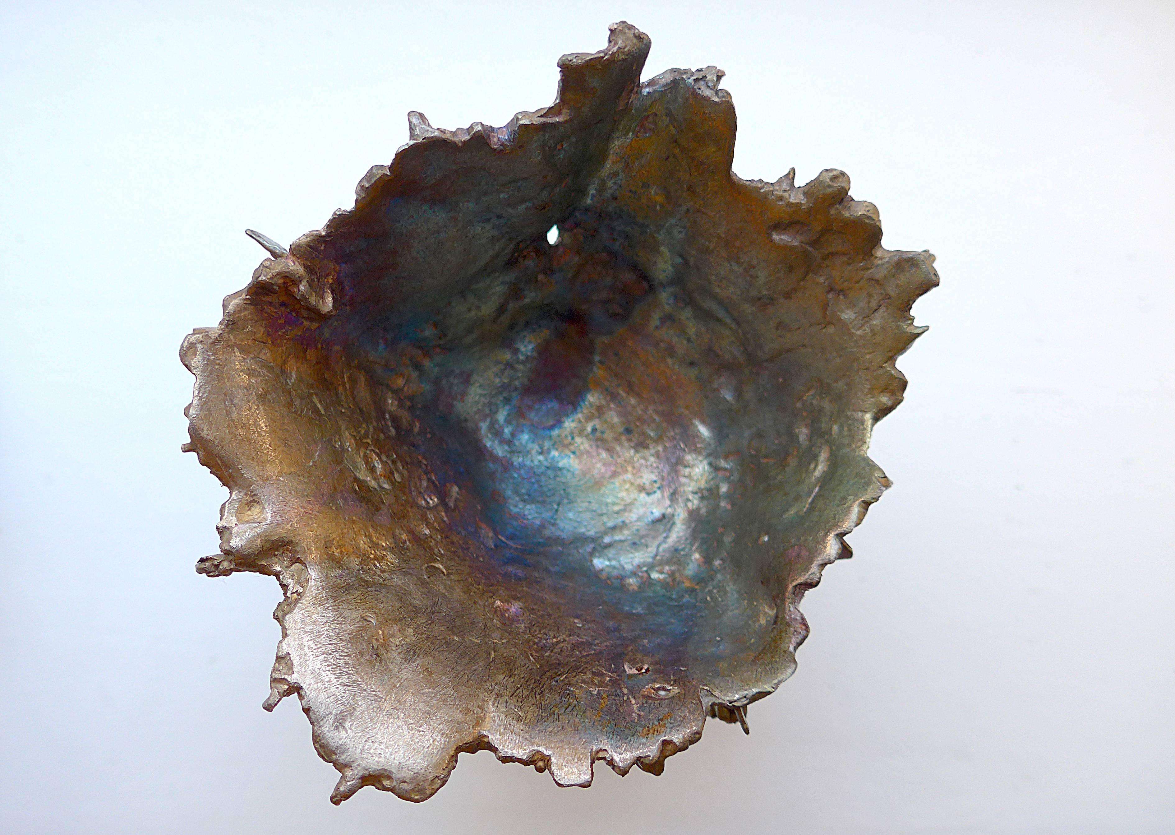 This bronze vessel was created in 2014 by Tabor and Villalobos. Graham Tabor and Miguel Villalobos create unique and limited edition jewelry and objects. 

Graham Tabor worked extensively as a designer in the fashion industry before founding his