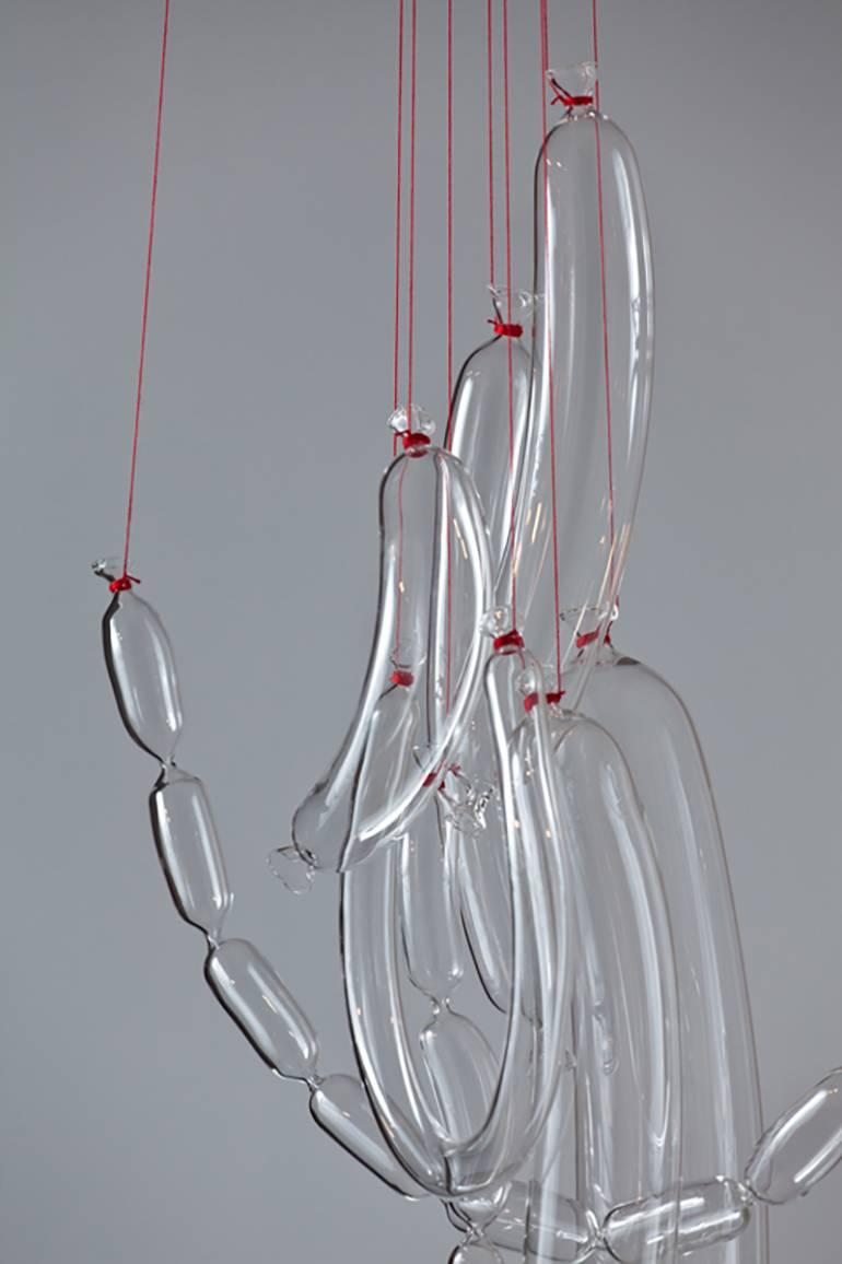 These handblown glass sausage sculptures titled 'Dans le cochon tout est bon' were designed by Sam Baron in 2010 and were first exhibited at a downtown Manhattan Japanese butcher shop. These pieces can be exhibited in many different ways and the