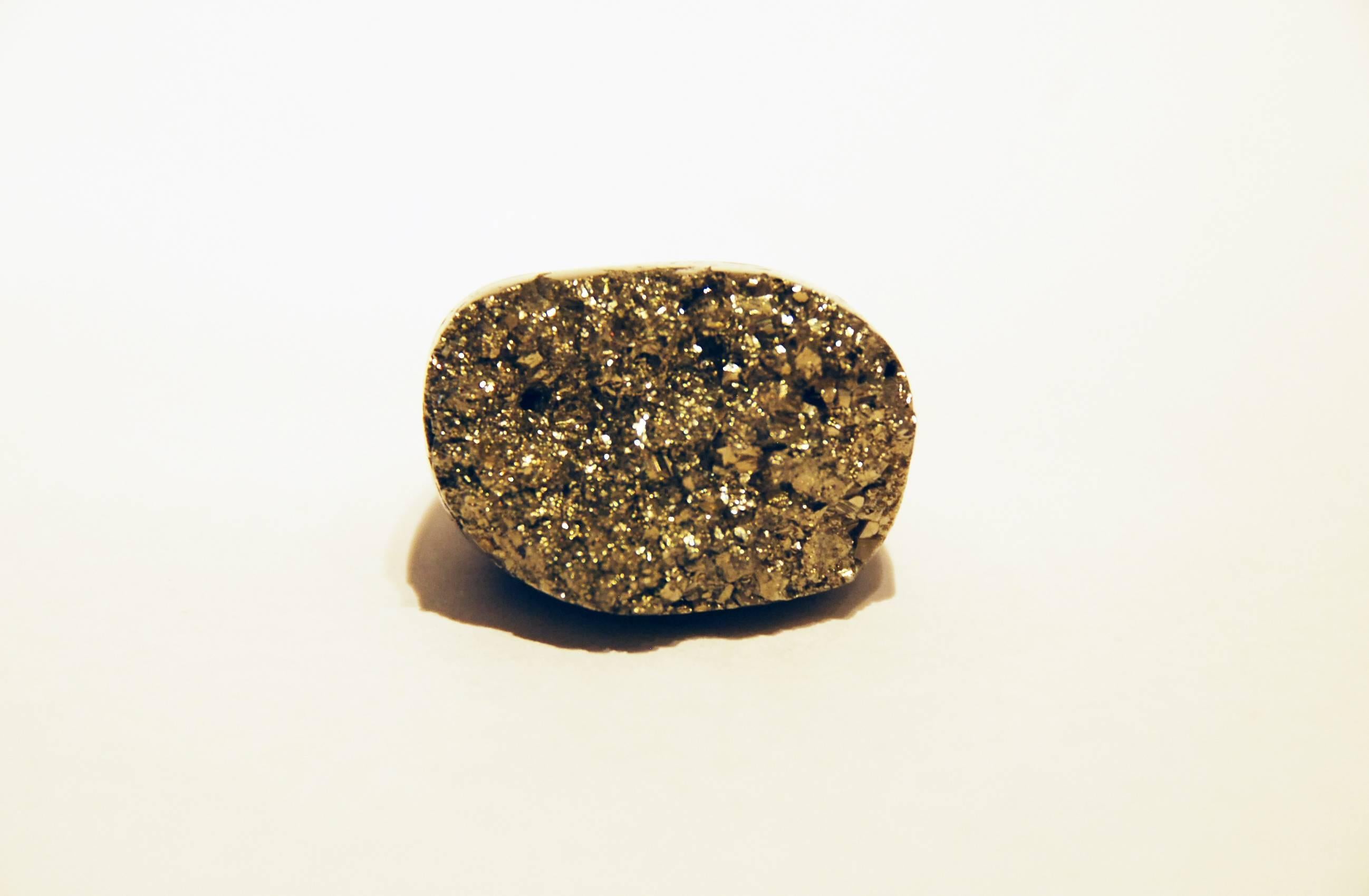 This beautiful pyrite and horn ring (size 8) was designed by Aureliano and Melba Palmeri for Pulowi. It is currently on view at Cristina Grajales Gallery in New York, NY. 

Since the founding of Pulowi in 2002, Aureliano and Melba Palmeri have