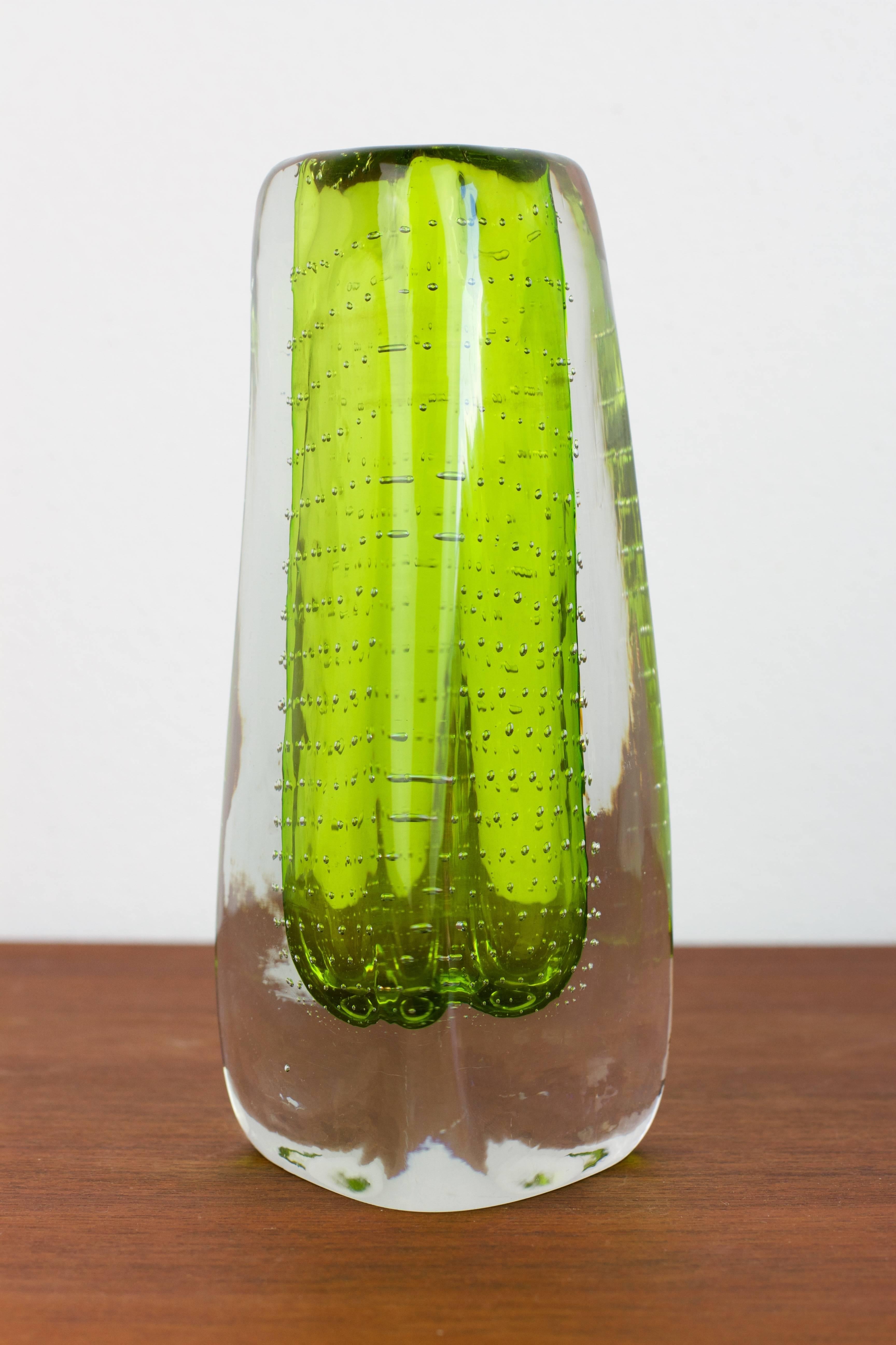 Very much in the style of Finnish designer Gunnel Nyman for Nuutajarvi Notsjo, Finland - this vintage Mid-Century vibrant emerald green ice glass looks typically Scandinavian however, it was produced by the German glass manufacturer Theresienthal