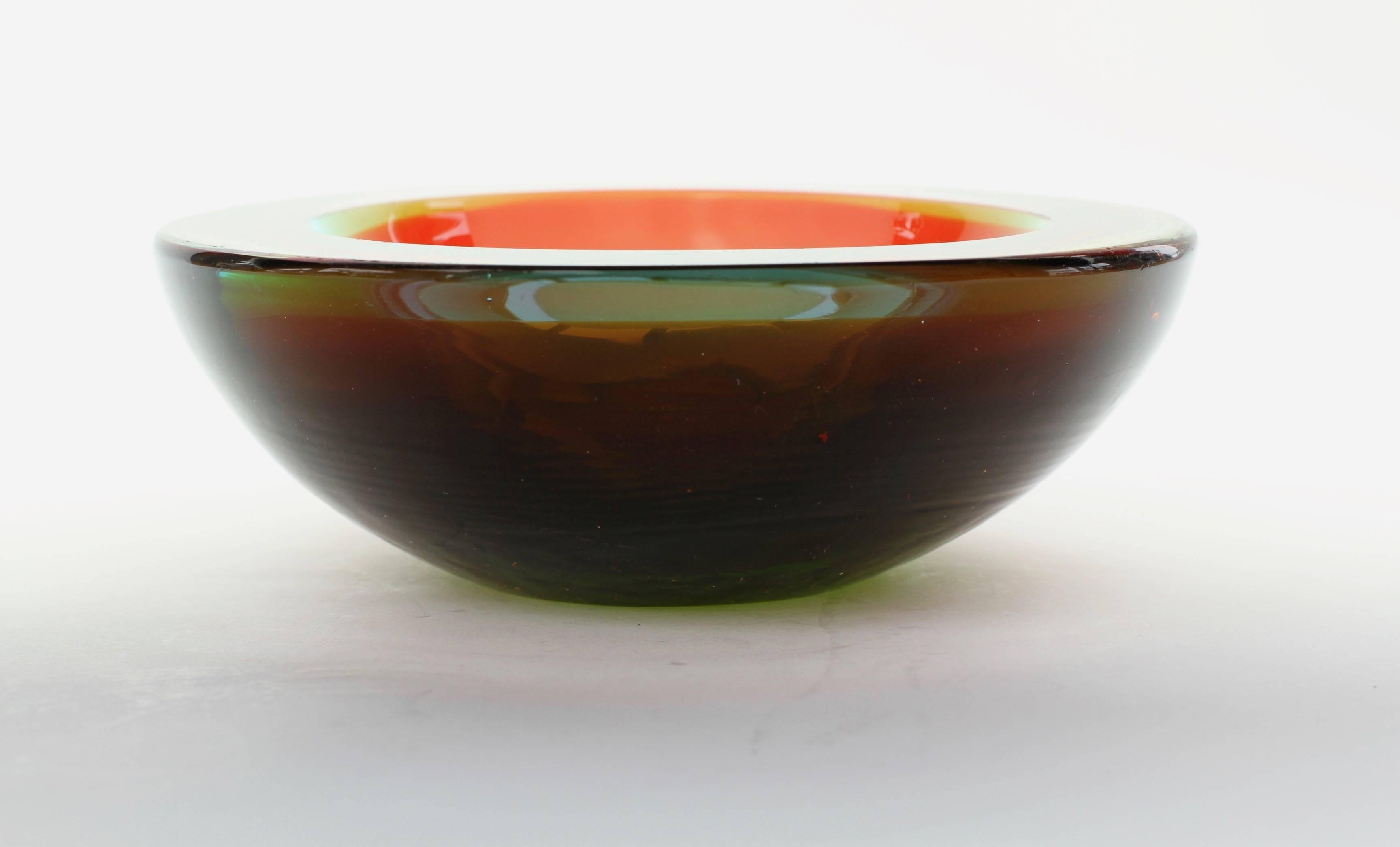 Gorgeous little Murano glass 'Geode' bowl by an unknown maker, circa 1960-1969. The colors are quite delightful with hues of green, burnt orange, sky blue and lilac.