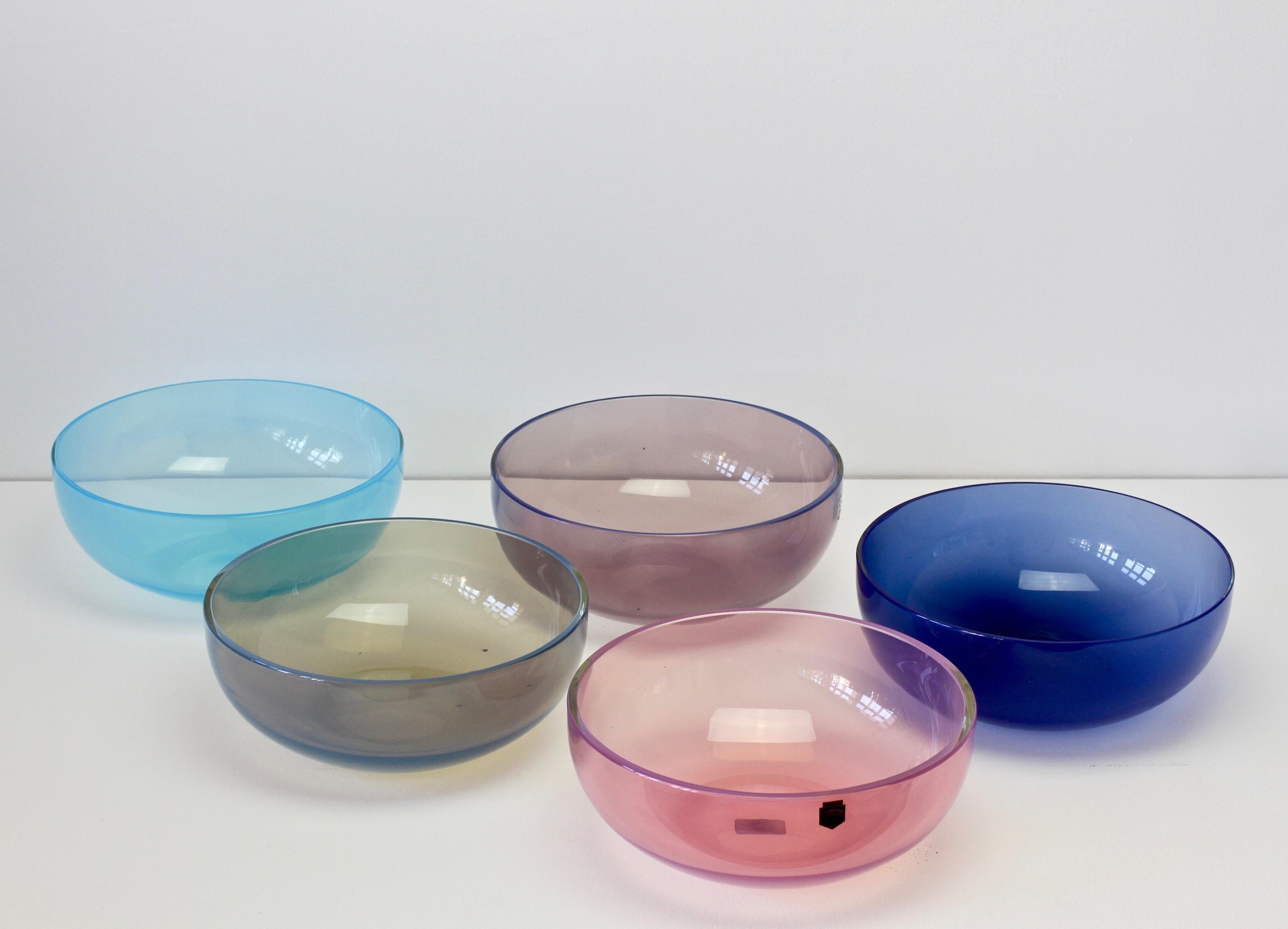 Signed set or ensemble of five 'Opalino' Murano glass bowls designed by Antonio da Ros (1936-2012) for Cenedese, circa 1970-1990. Wonderful translucent colors of vibrant blues, aubergine, moss green and pink. Simplistic yet elegant forms - almost