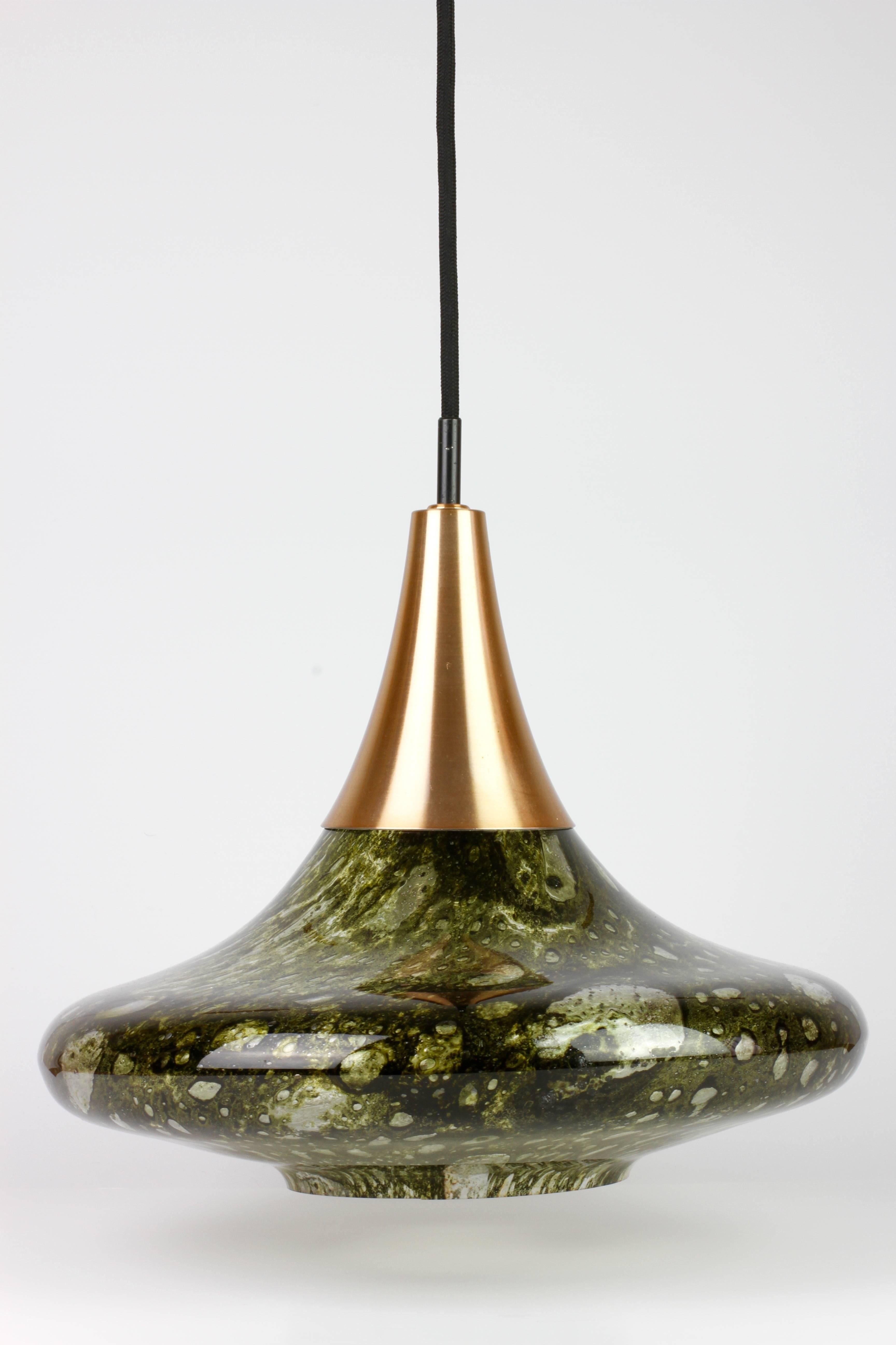 A beautiful Mid-Century Bubble glass pendant light by Doria Leuchten, Germany. Made in the later half of the 1960s to early 1970s, this gorgeous pendant features wonderfully made, mouth blown Murano glass in a very interesting form reminiscent of a