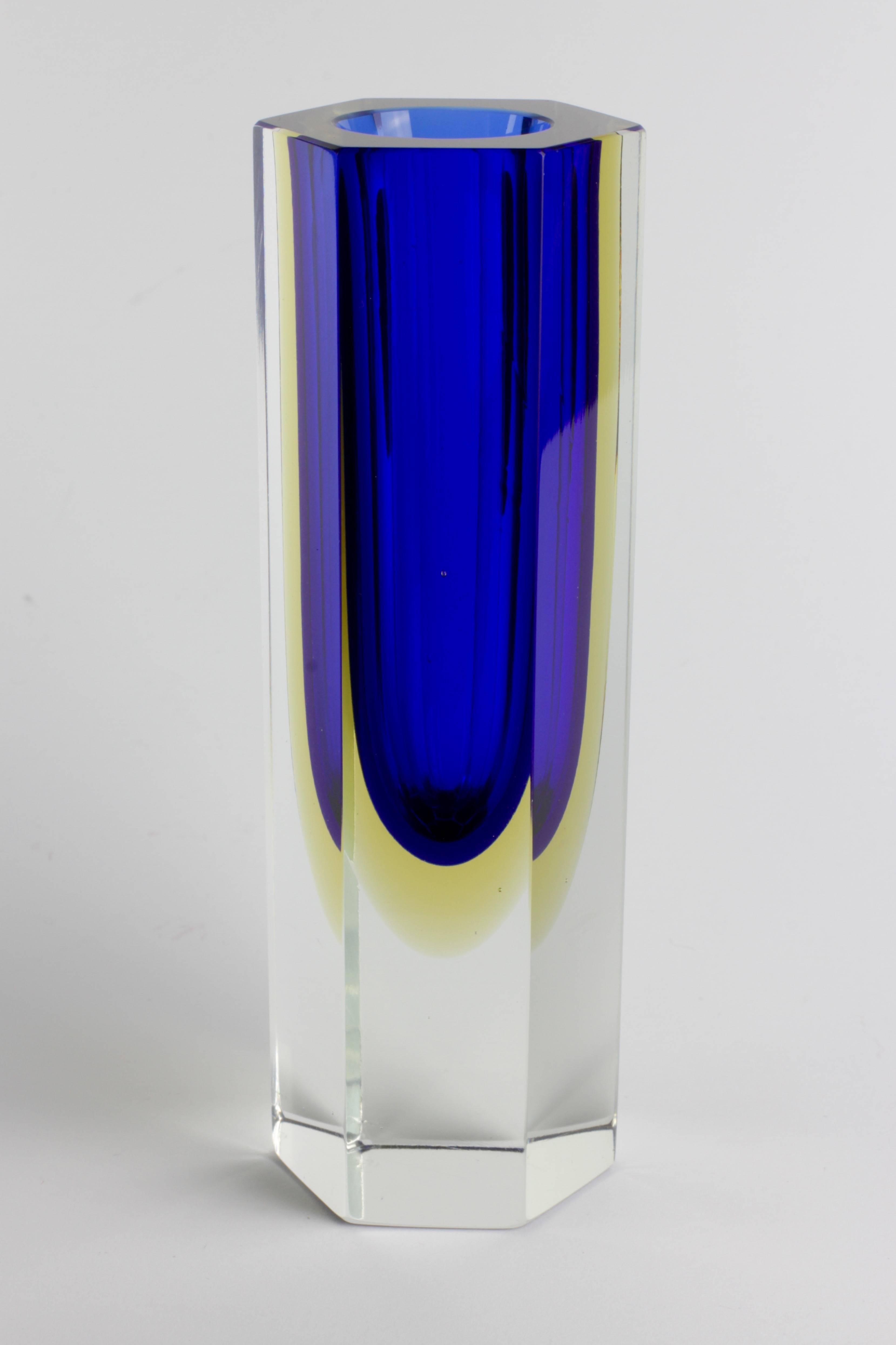 A gorgeous six sided faceted Murano glass vase attributed to Mandruzatto, circa 1960. An absolutely lovely colour combination of Saphire blue to pale yellow to clear 'Sommerso' or 'Submerged' glass technique.

Take a look through our 1stdibs store