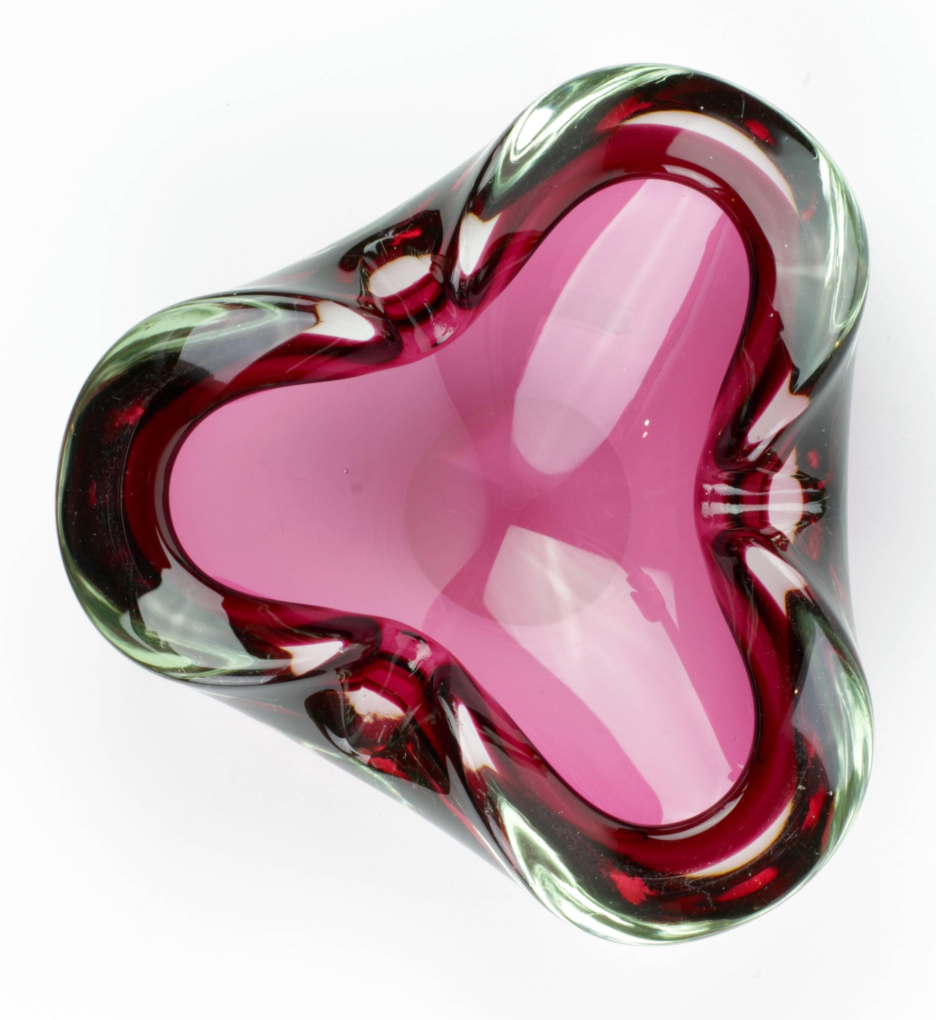A wonderful pink Murano glass bowl with three folded edges and utilising the Sommerso technique. Would make a very pretty bathroom dish for soap or jewellery bowl.