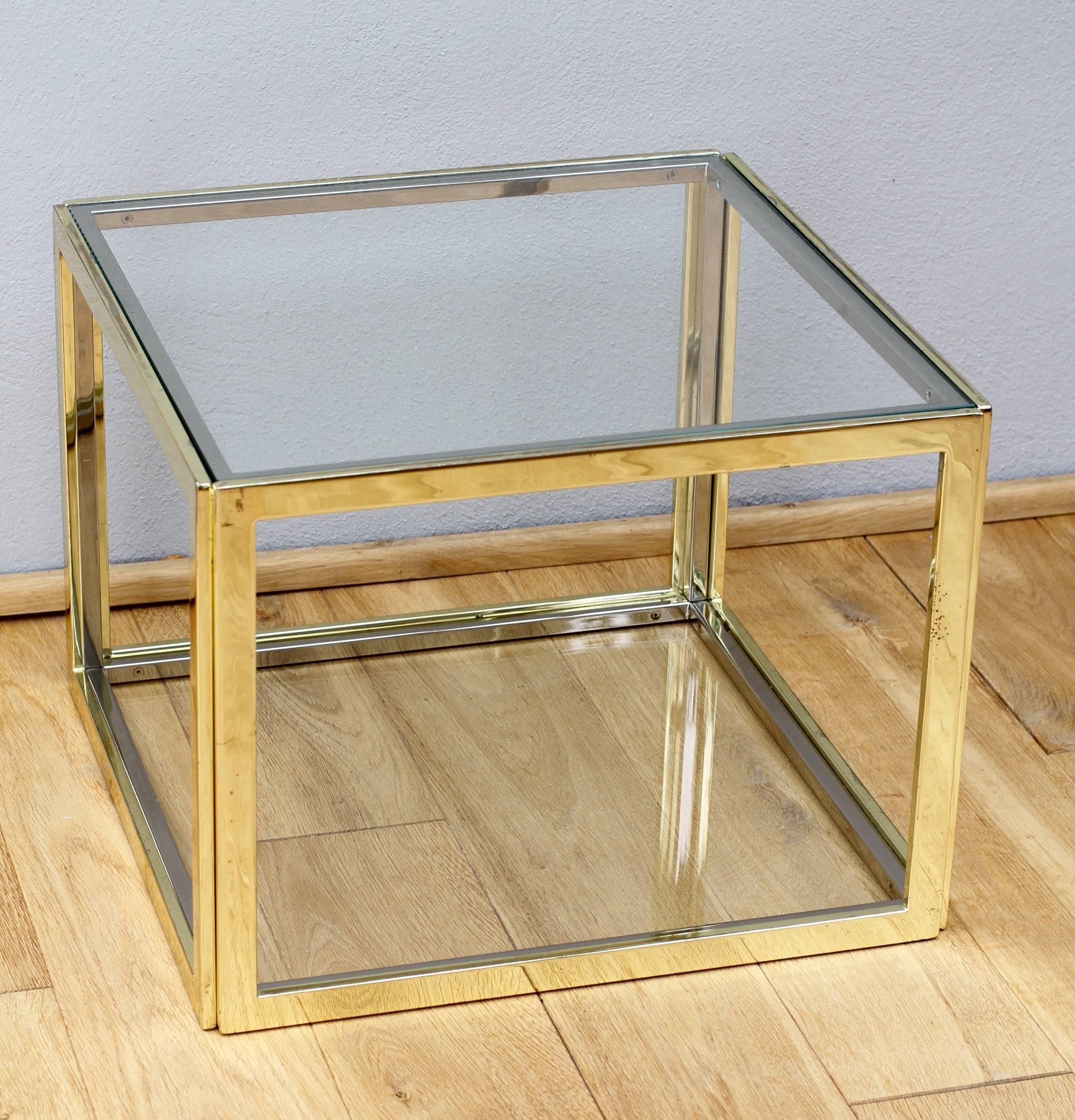 A stunning bi-color (bi-colour) side table by Maison Charles, circa 1970. These tables are usually found as a set of four which go together with a large square coffee table.

Comprising a chrome-plated metal cube covered on all sides with