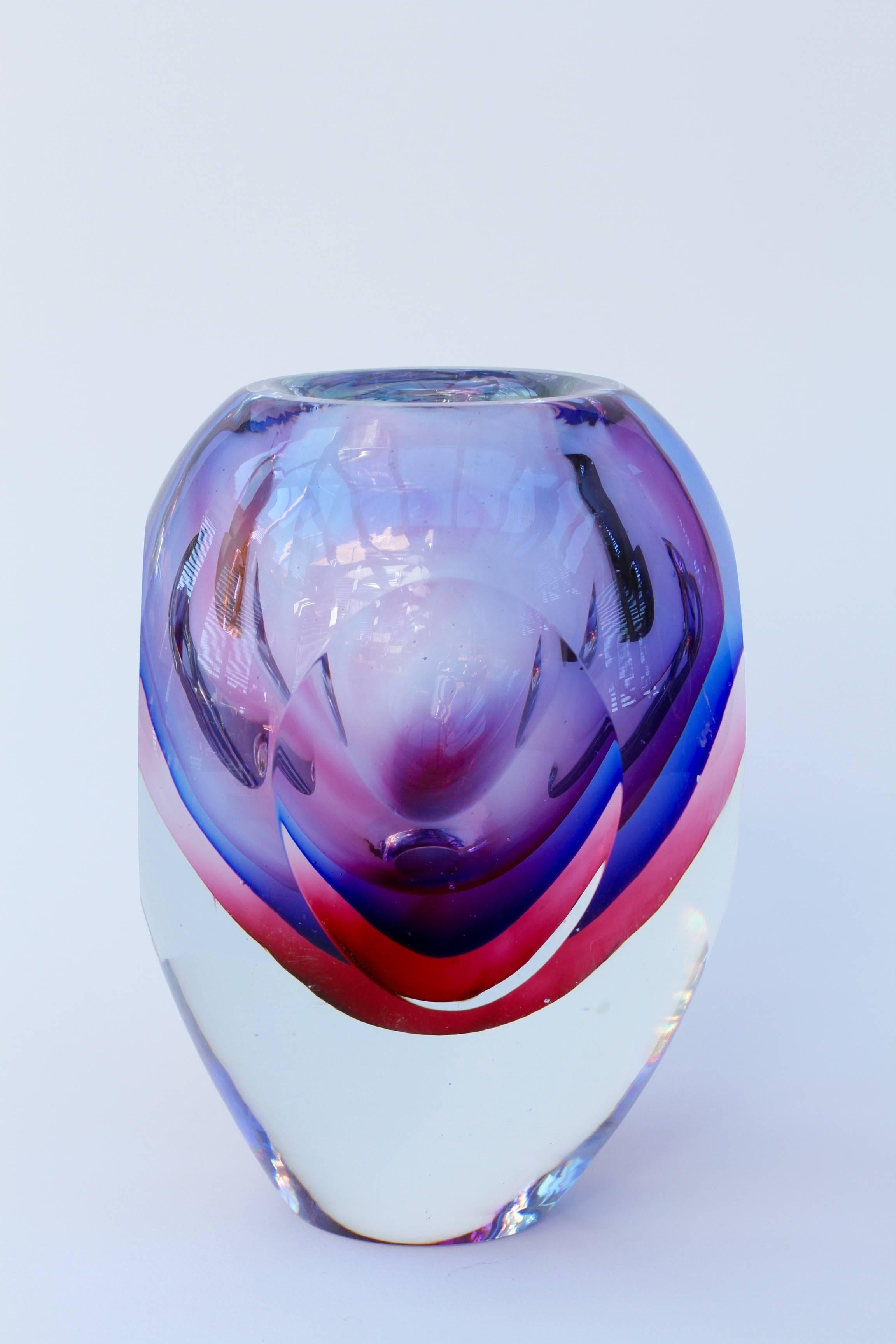 A stunning, vintage, vibrant and colorful (colourful) mouth blown Murano art glass bowl or vase attributed to Luigi Onesto. Absolutely exceptional in every way utilising the Sommerso technique featuring lilac over cobalt blue over rose pink over