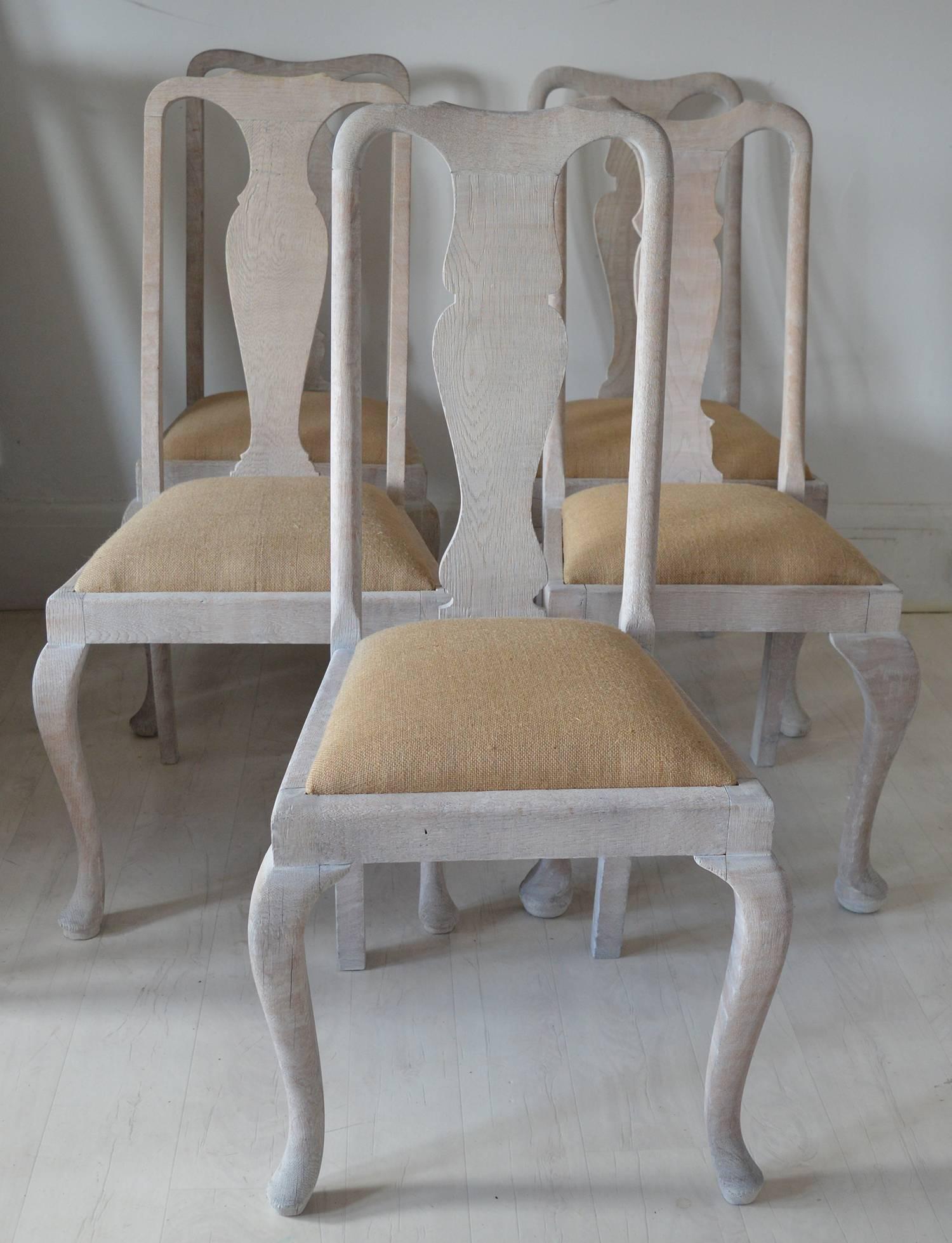 A set of ten limed oak dining chairs made up of five pairs.

I have priced them individually because you might want a set of six or eight chairs. I can also extend the set to 12 or 14 because I have other similar pairs.

Each pair has a