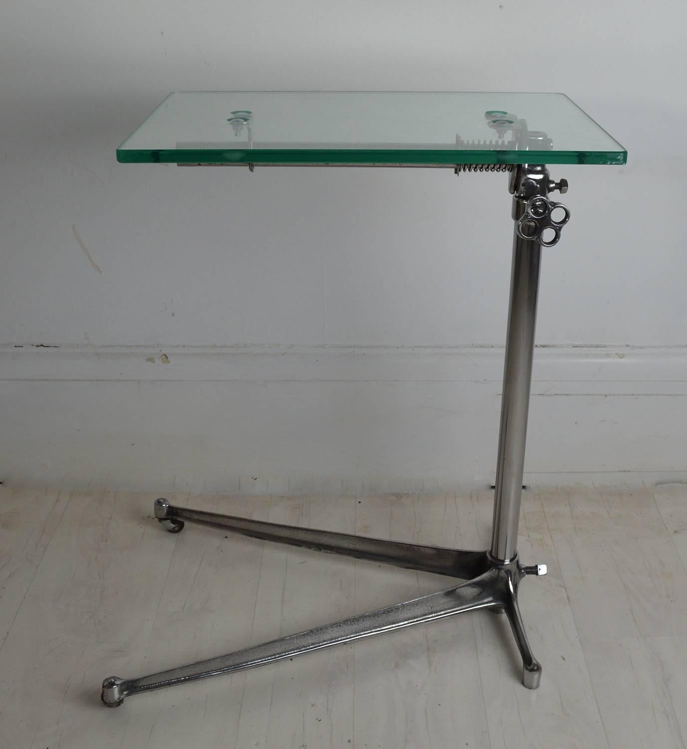 Stylish side or work tables with an elegant Industrial look.

Make great sofa side tables or bedside tables.

Made of polished iron and steel with a new toughened glass top.

The top is adjustable by loosening the handle on the side.

The top can