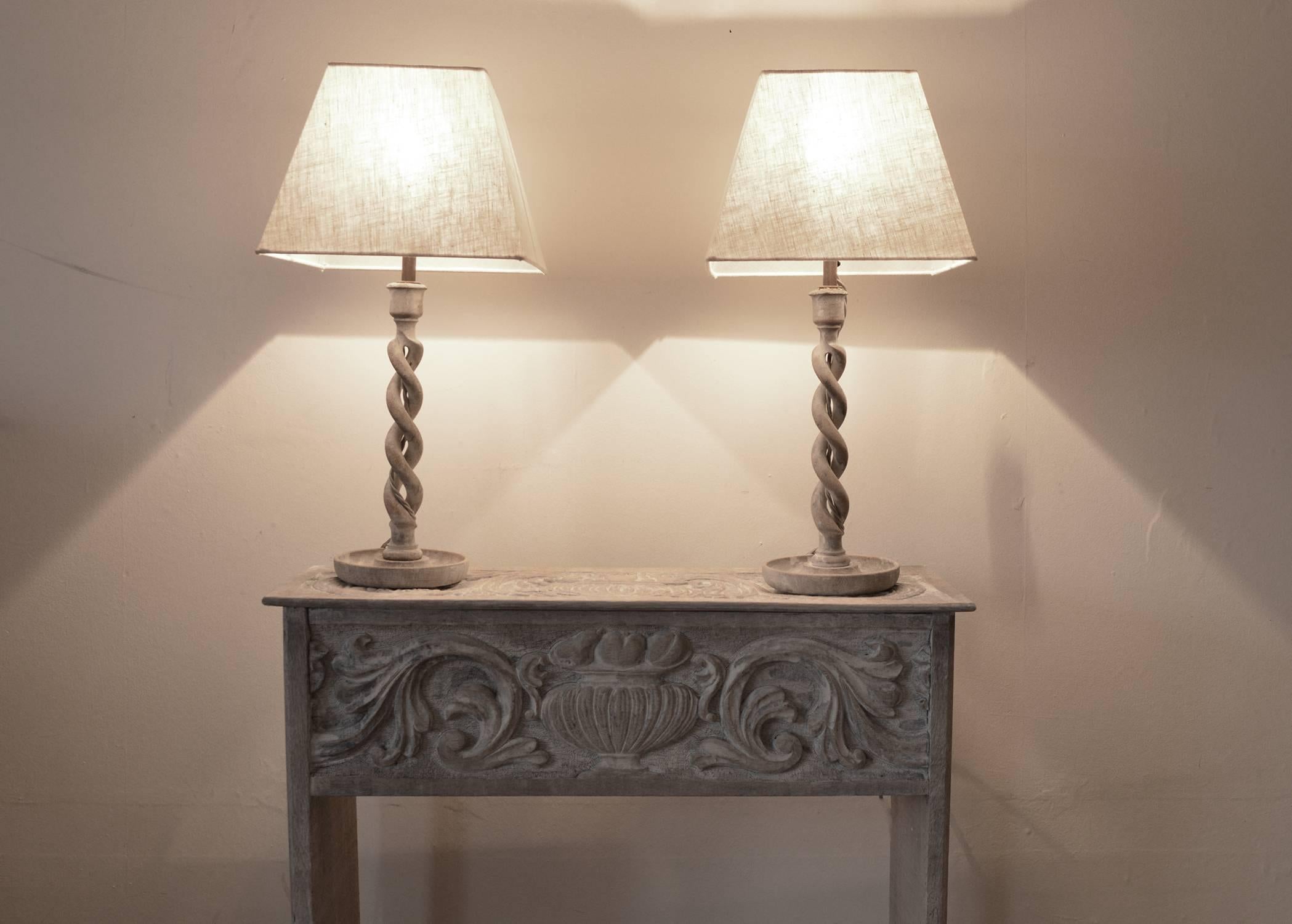 
Super pair of limed oak open twist table lamps.

The oak has been recently limed to enhance the beauty in the grain of the oak.

The shades are linen.

Professionally wired to UK standards.
