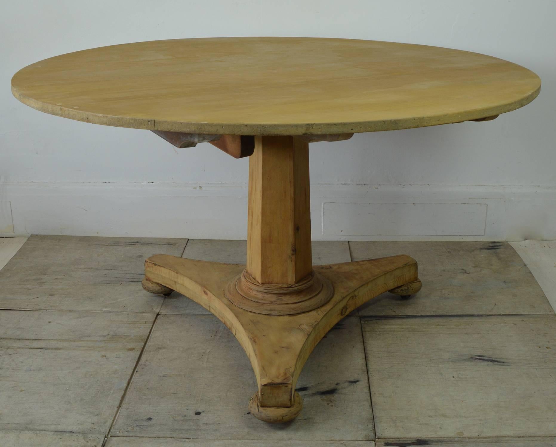
Wonderful dining or centre table with exquisite simple lines.

English, circa 1850. Waxed pine. Seats six to eight people.

On castors.

The table originally tipped. It is now a fixed top but there is remnants of this facility visible underneath.