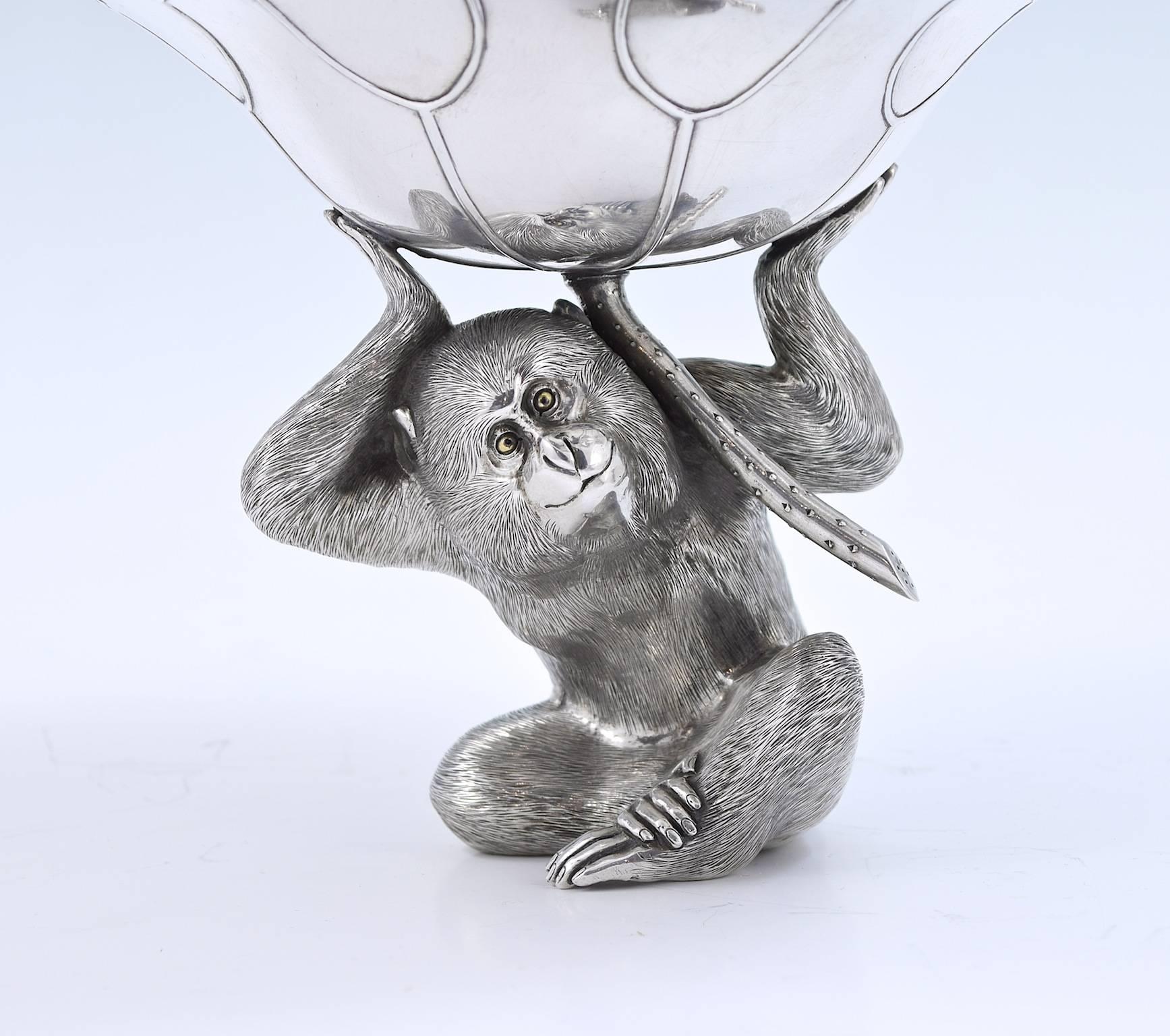 Japanese, solid silver circa 1900 each differently modelled as a Monkey, a Hare, a Cat & a Fox. Each holding a different 'leaf' which forms the dish. Approximate dimensions of each piece: 13cm high, 18cm dish diameter, weight 60.5oz (1887g).