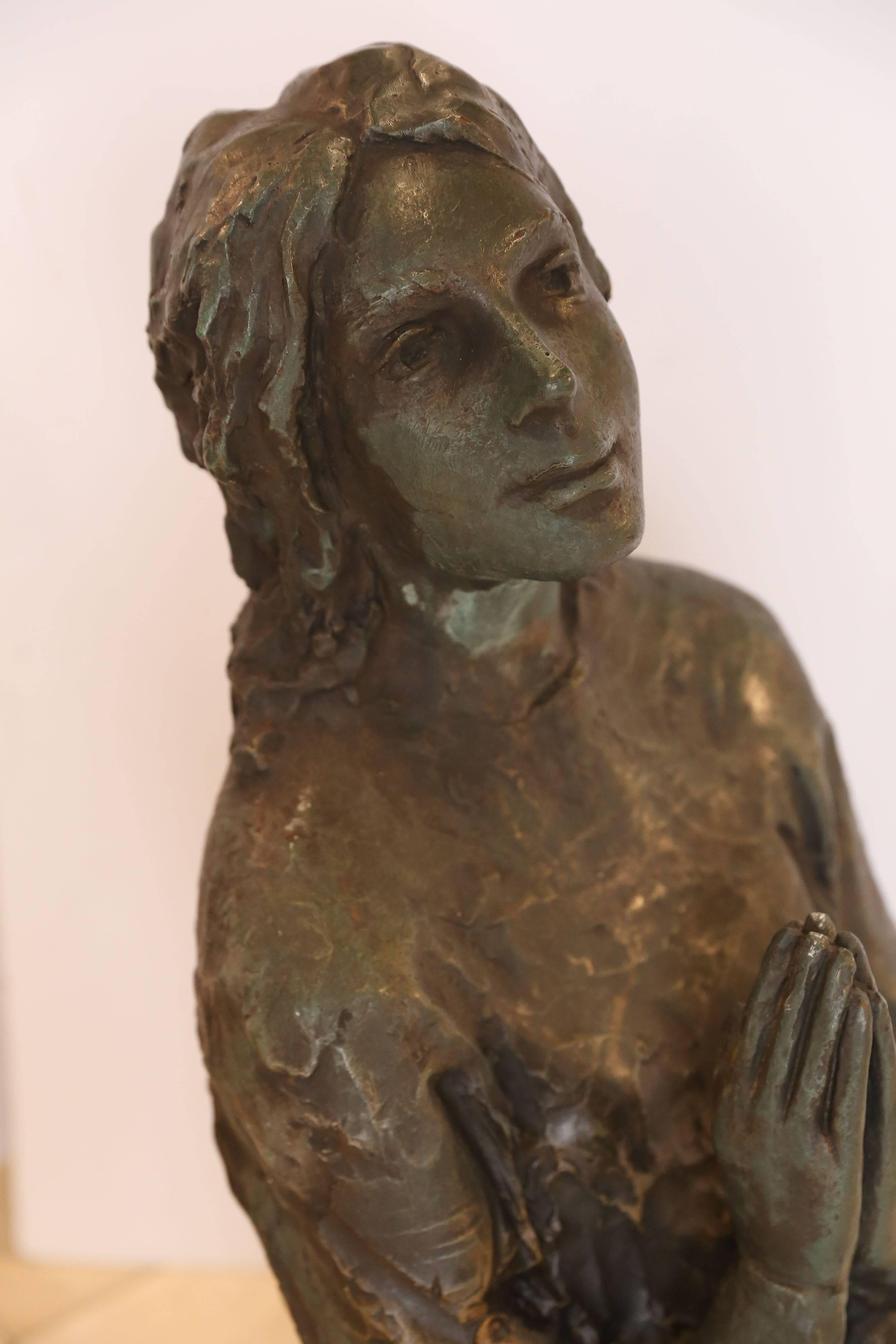 An Italian statue of a lovely young girl, looks to the heavens for an answer to her prayers. Fonderia Artistica has been creating bronzes since 1913 using a technique referred to as lost was casting. Lost-wax casting is the process by which a