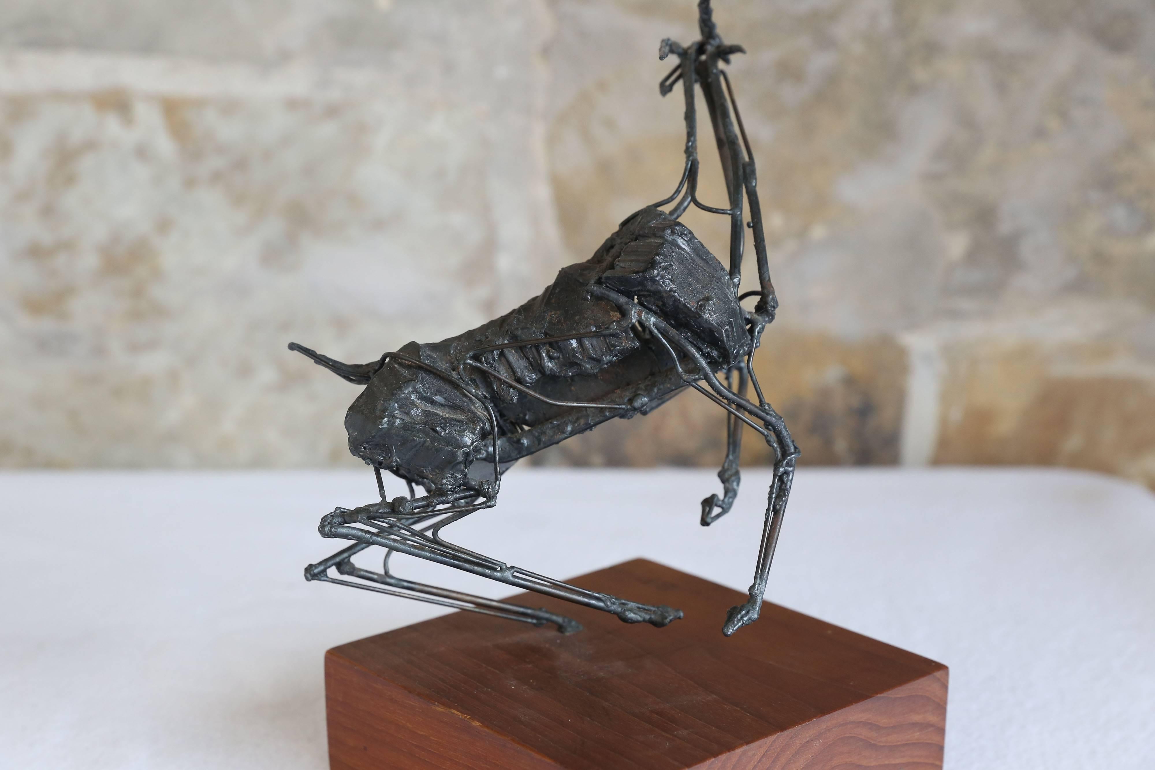 Antelope, metal rods twisted, bent and curved, carries the brazenness of the animal as it rears in anticipation. Robert "Bob" K. Fowler (1931-2010) featured nature at its best. This fantastic sculpture by the well-known Texas artist is