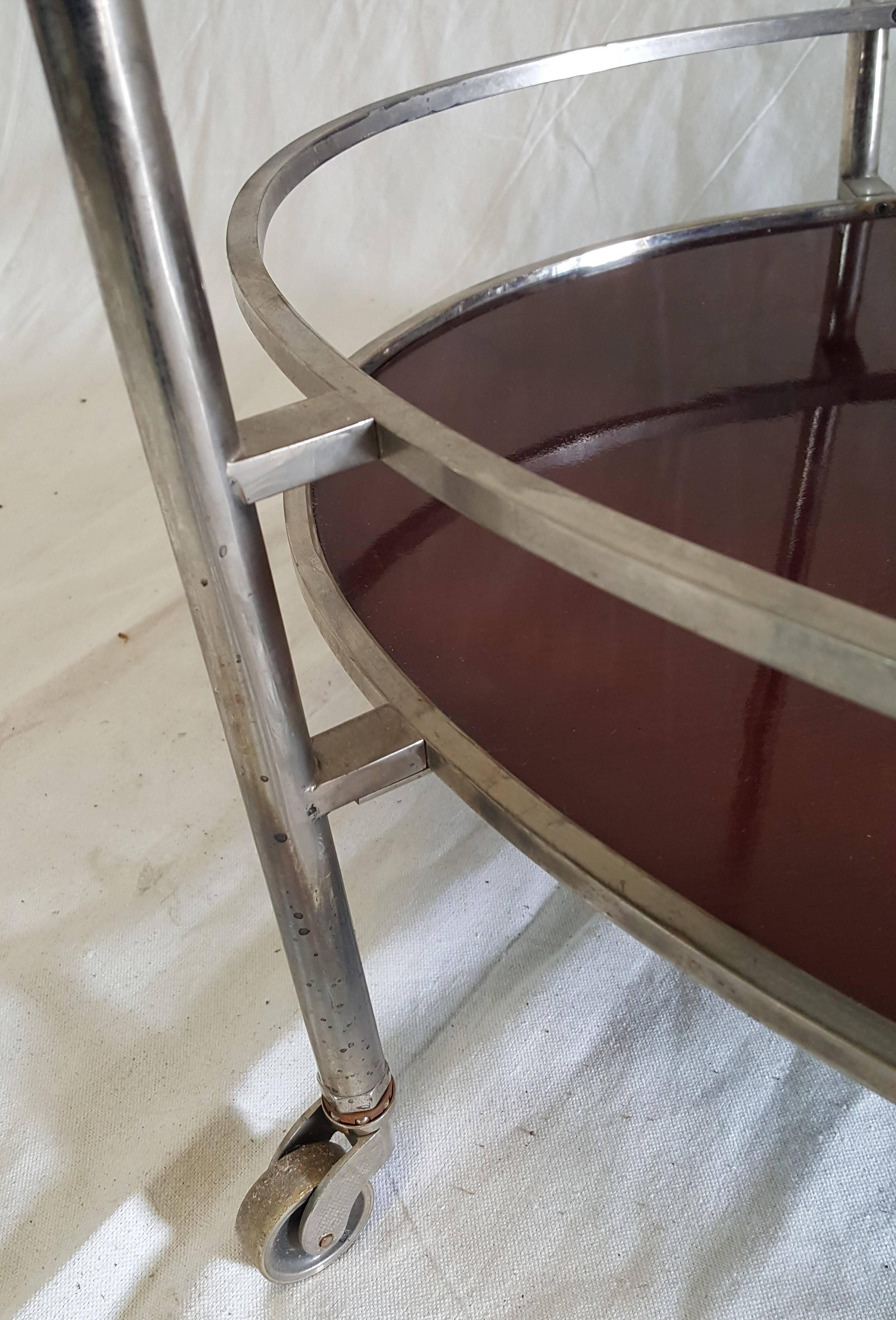 Mid-Century Oval Polished Stainless Steel and Chrome Cherry Wood Bar Cart In Good Condition For Sale In Houston, TX