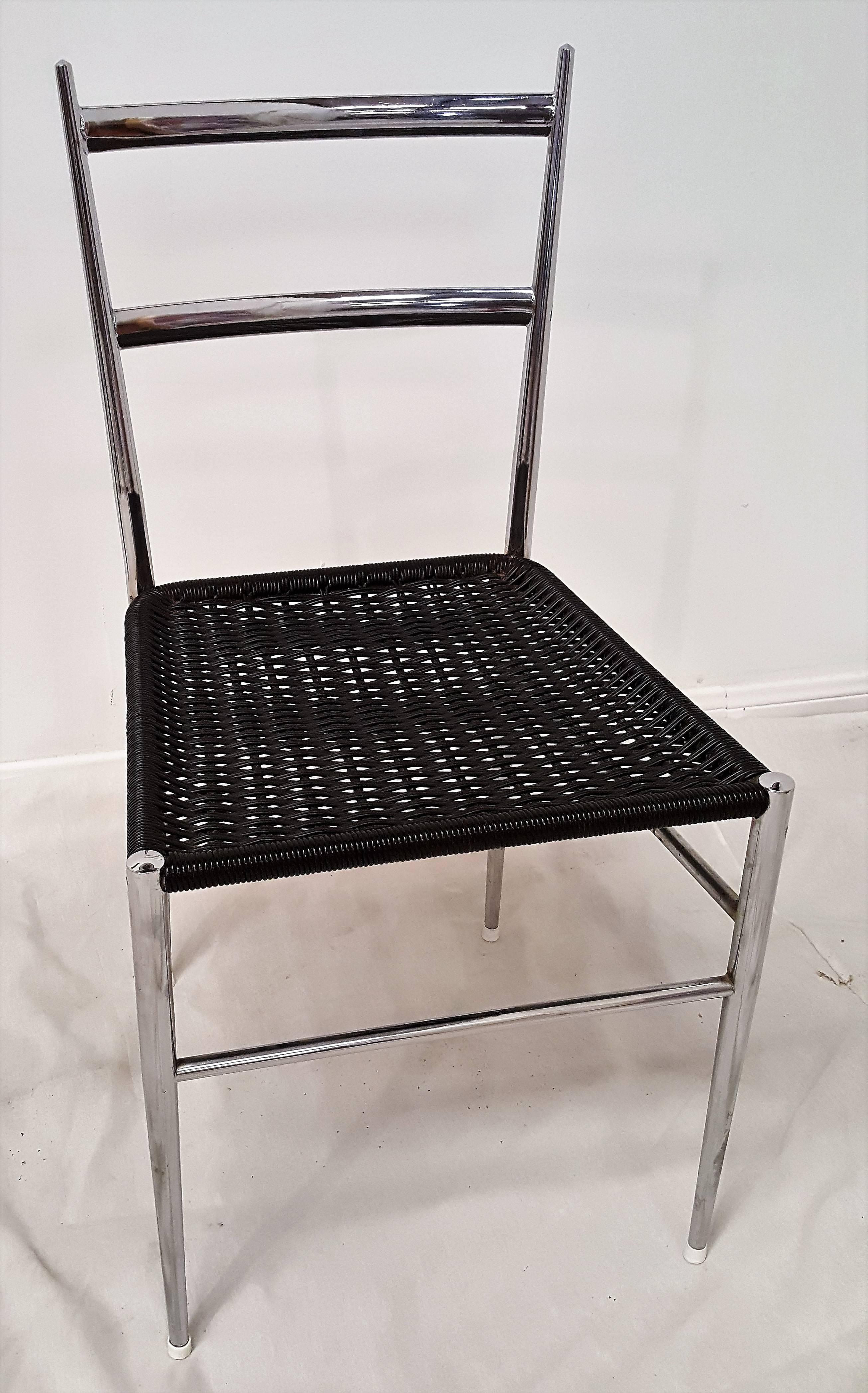 Super cool and super Mid-Century set of Gio Ponti style chrome chairs named the Superleggera or Super-light. The chair is strong but light enough it may be lifted by a child using just one finger. This group has the highly polished chrome with black