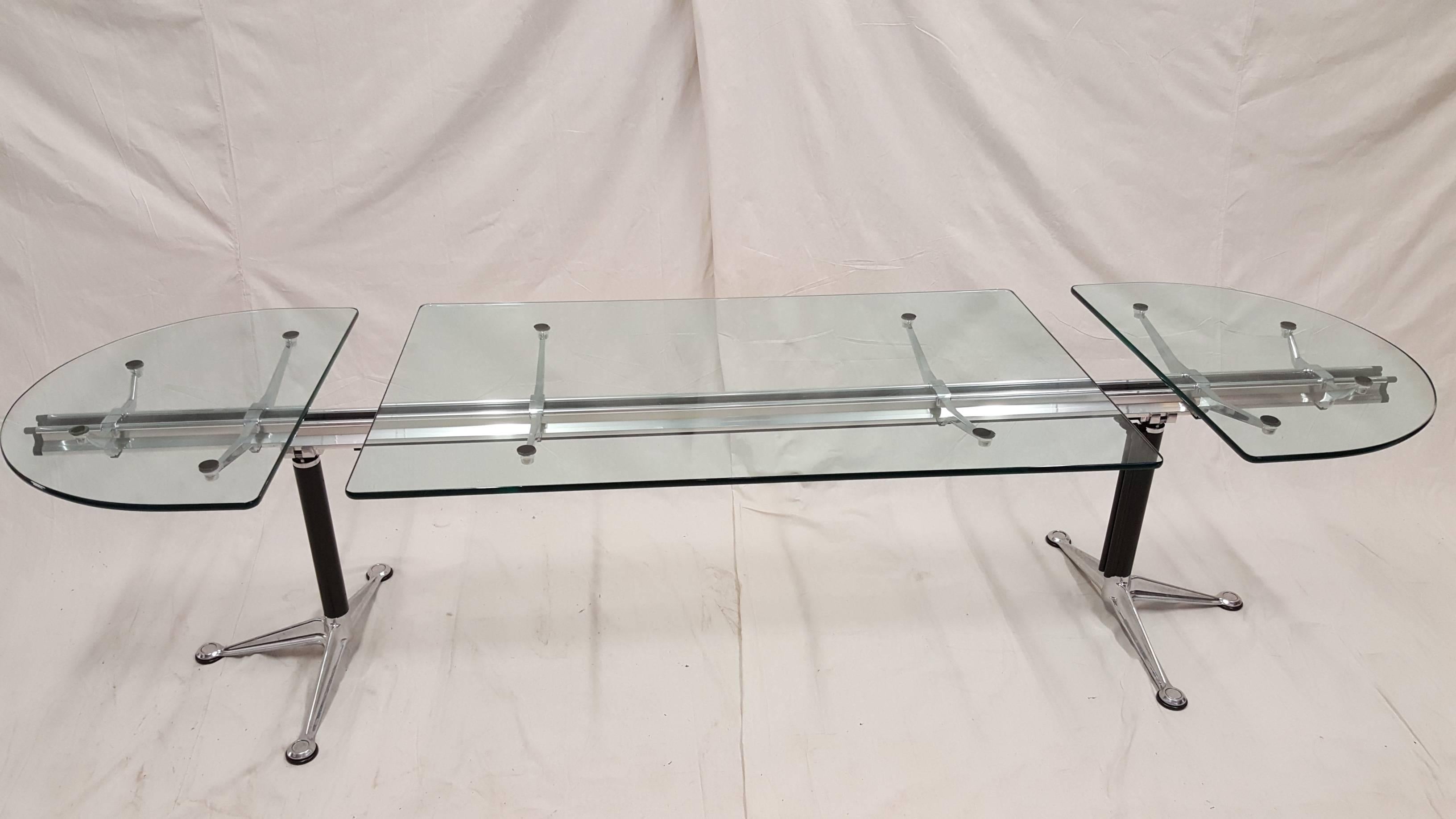 Table desk by bruce burdick for herman miller, can be use as table or desk, its a fully functioning table systems its a example of how beautiful sculpture aluminum and glass look when combined.