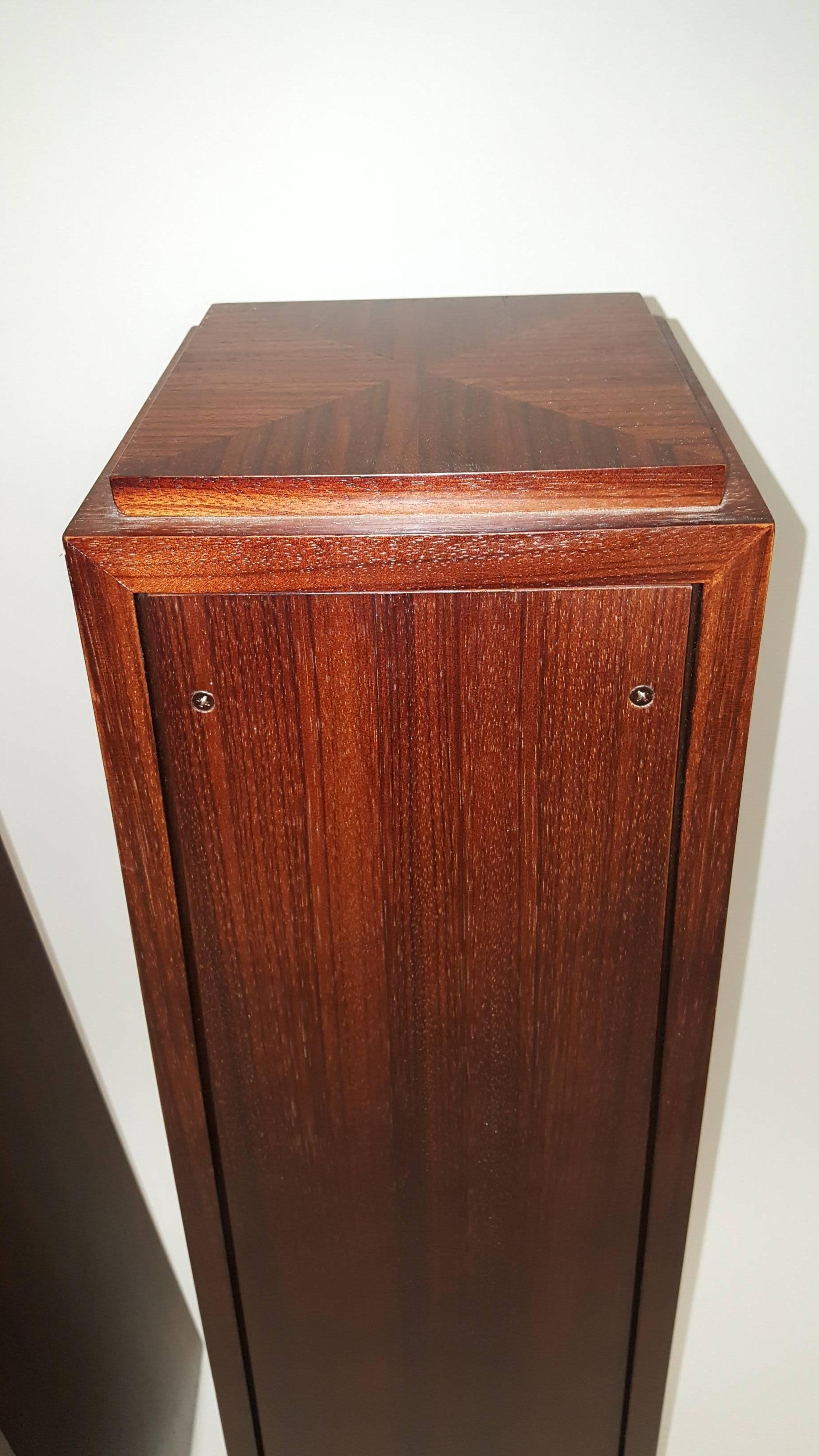 Beautiful pair of rosewood pedestals with great wood grains, the back screws off for storage space. Perfect for small sculpture.