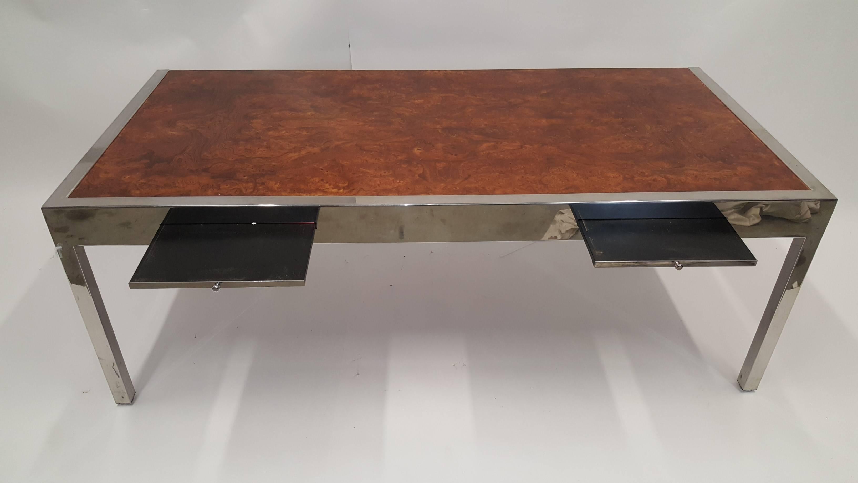 Rare four-draw pace pencil desk with pull-out trays. Beautiful burl wood with chrome frame. Well-constructed. Designed by Leon Rosen.  Some surface wear on top of desk.