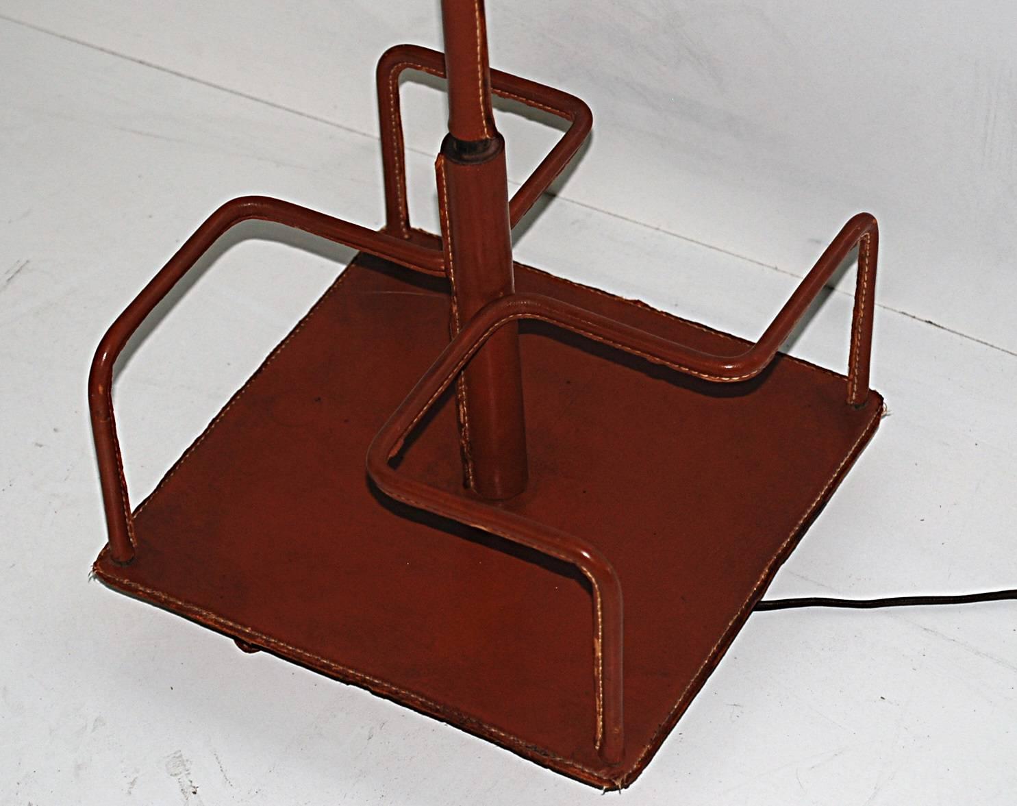 Rare Adnet leather bound book carousel stitched leather lamp.