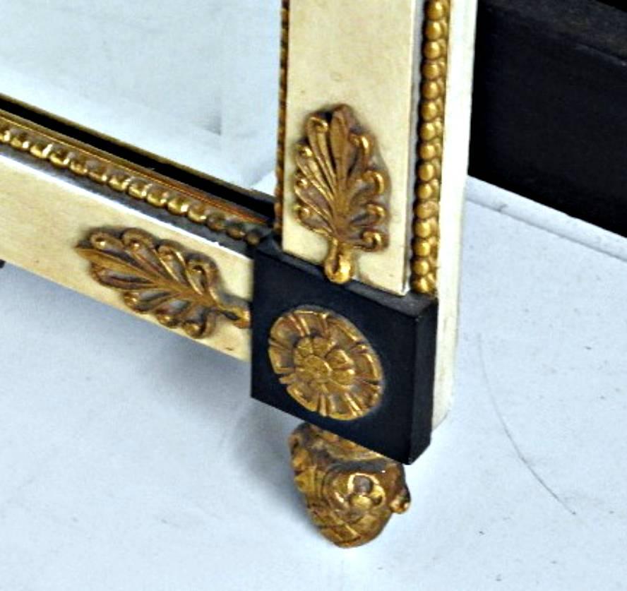 Neoclassical style hand-carved, gilded and laquered mirror by FB Decorative Arts NY.