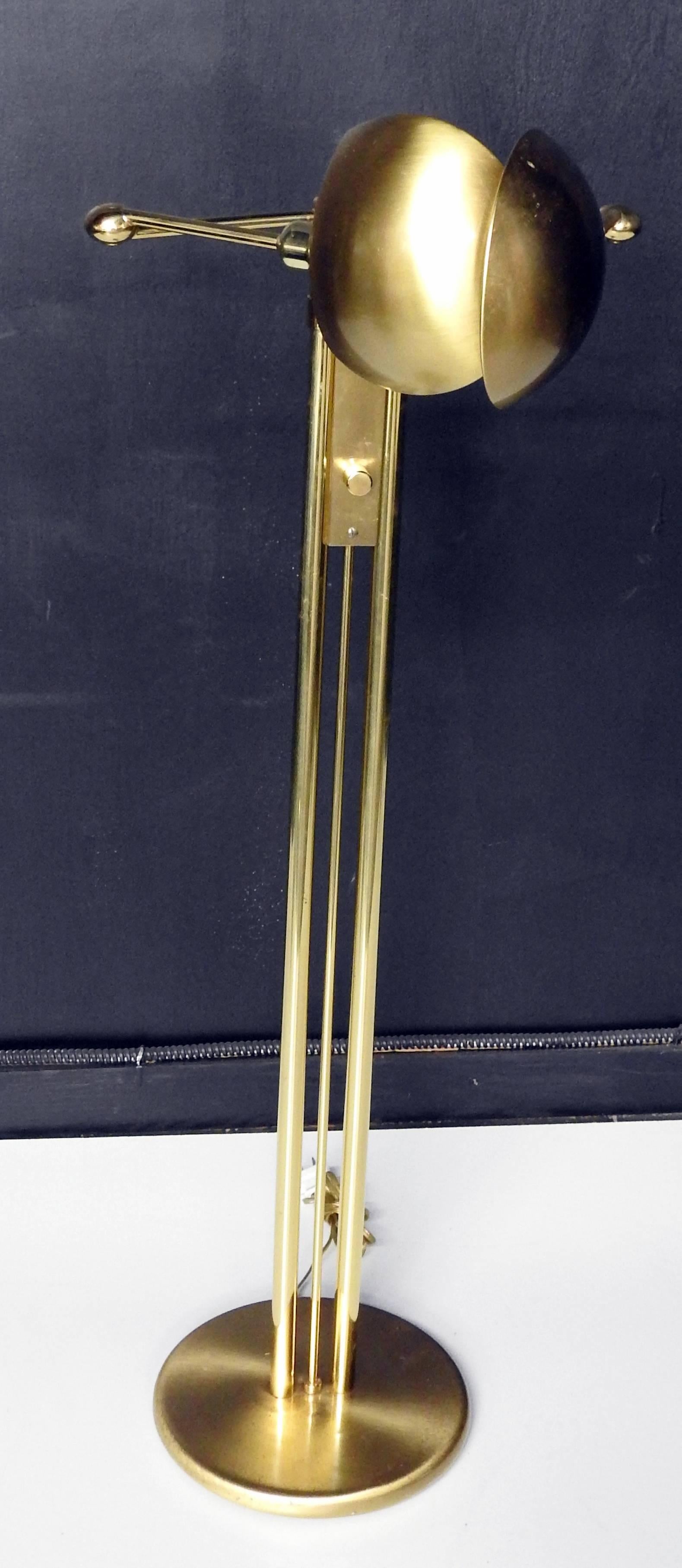 This pharmacy floor lamp has two swing arm lights for versatile lighting options. Pharmacy style arms are fully adjustable and dimmable. Antiqued brass finish on solid brass construction. Adjusts from 40