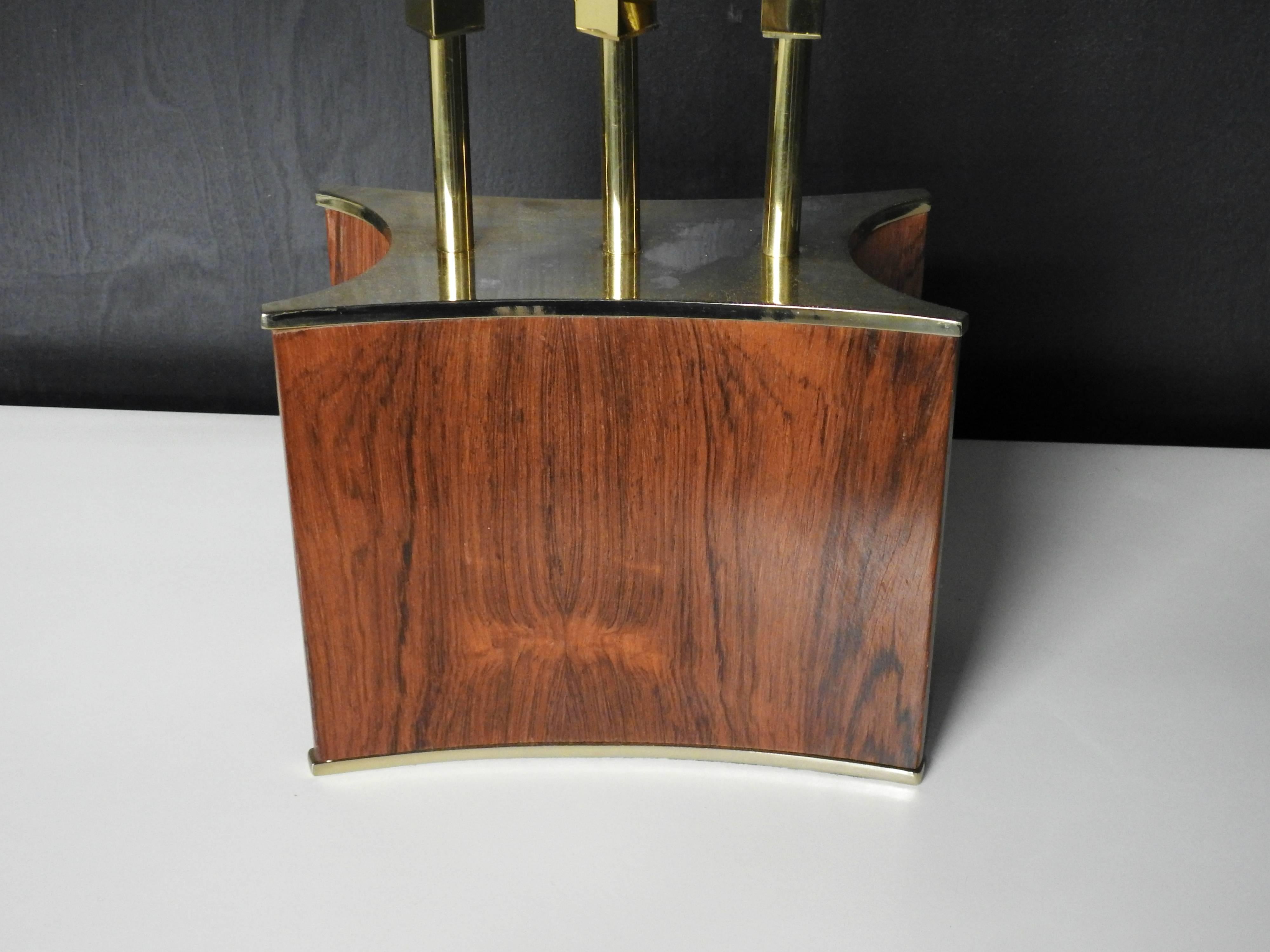 Mid-Century Modern rosewood and brass floor lamp attributed to laurel lamp. Measurements include the shade.