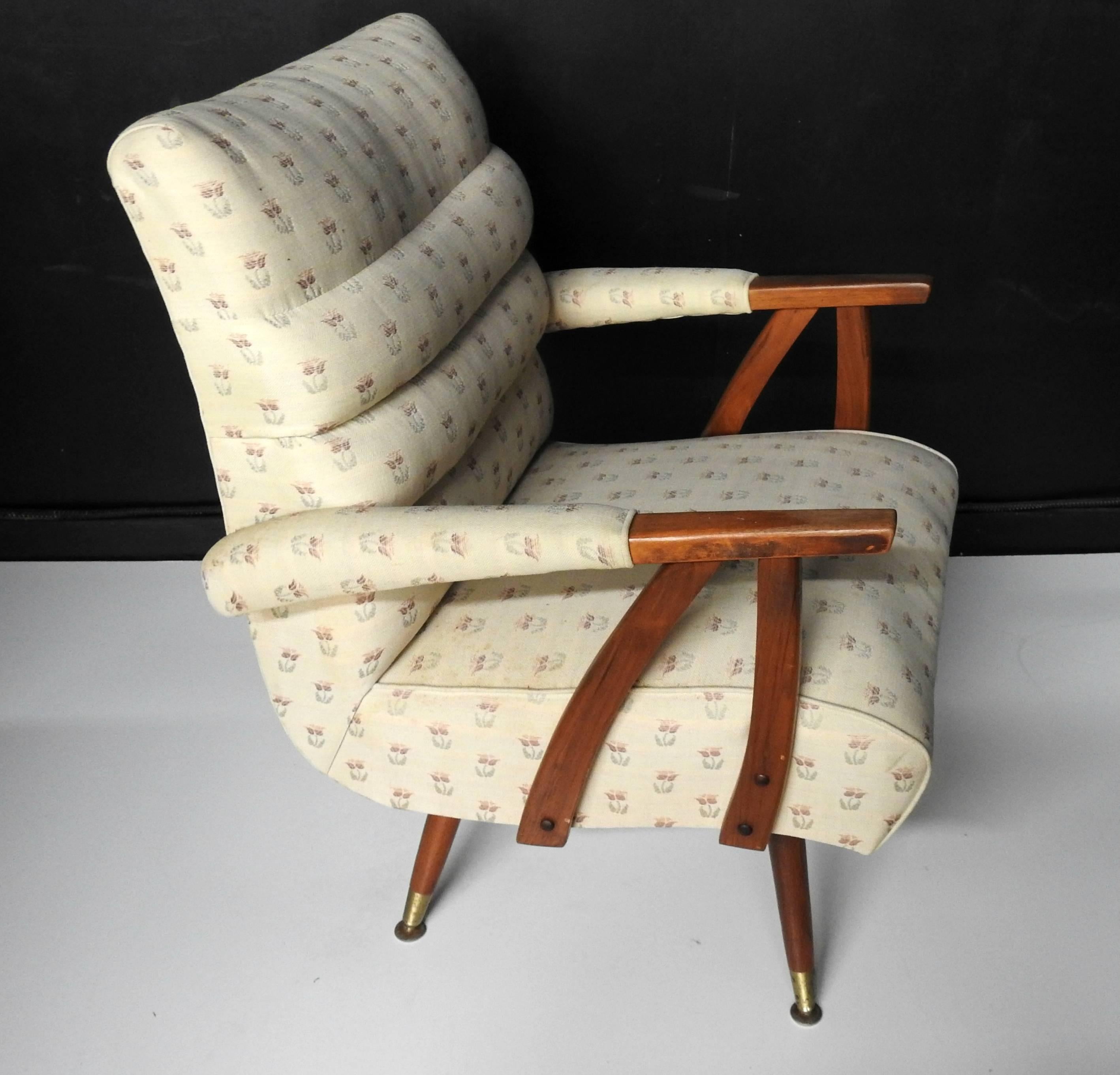 Pair of Italian style rocking easy chairs with brass sabots by Schlager upholstery.