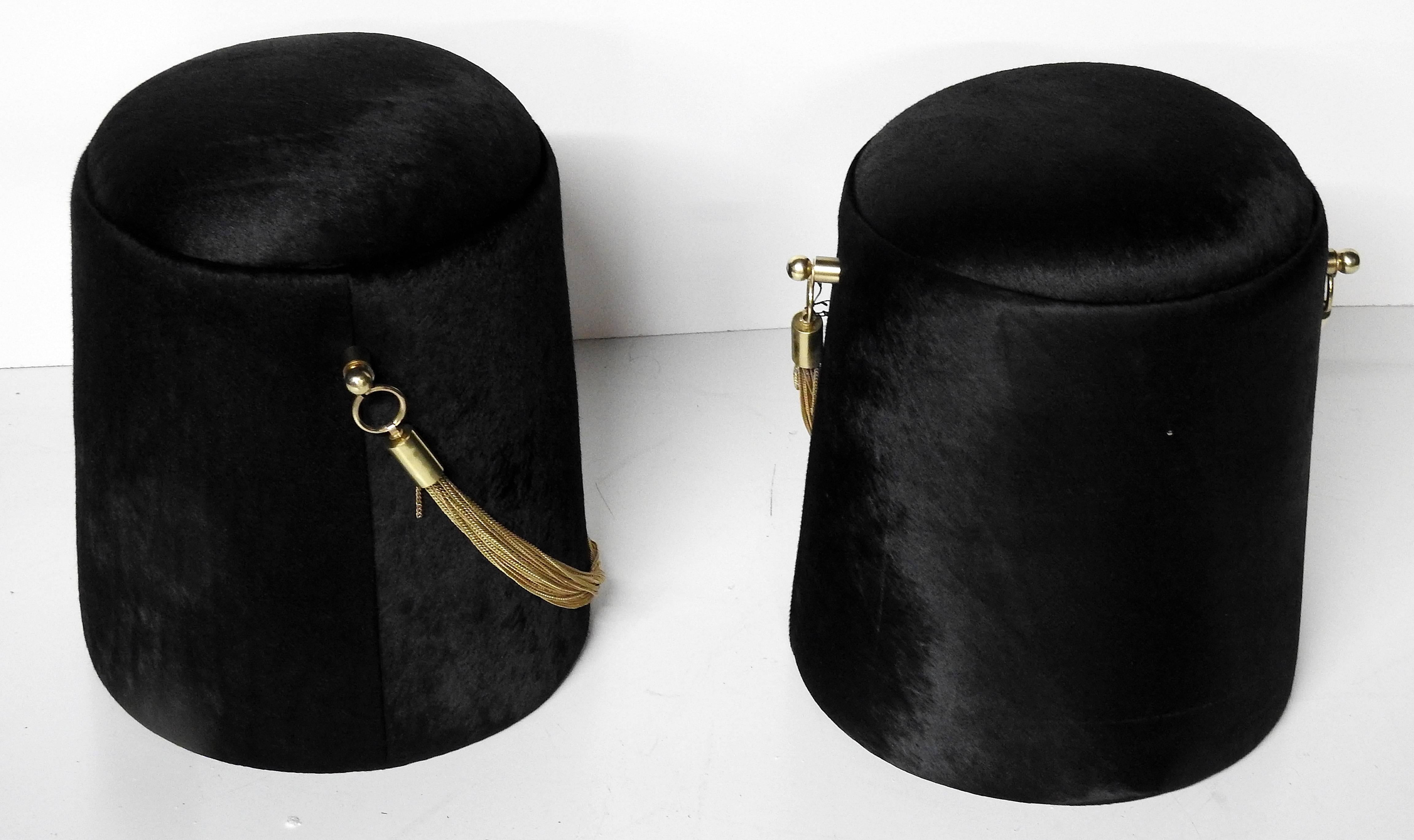 Pair of hair on leather covered poufs reminiscent of the Bearskin of the British foot guards.